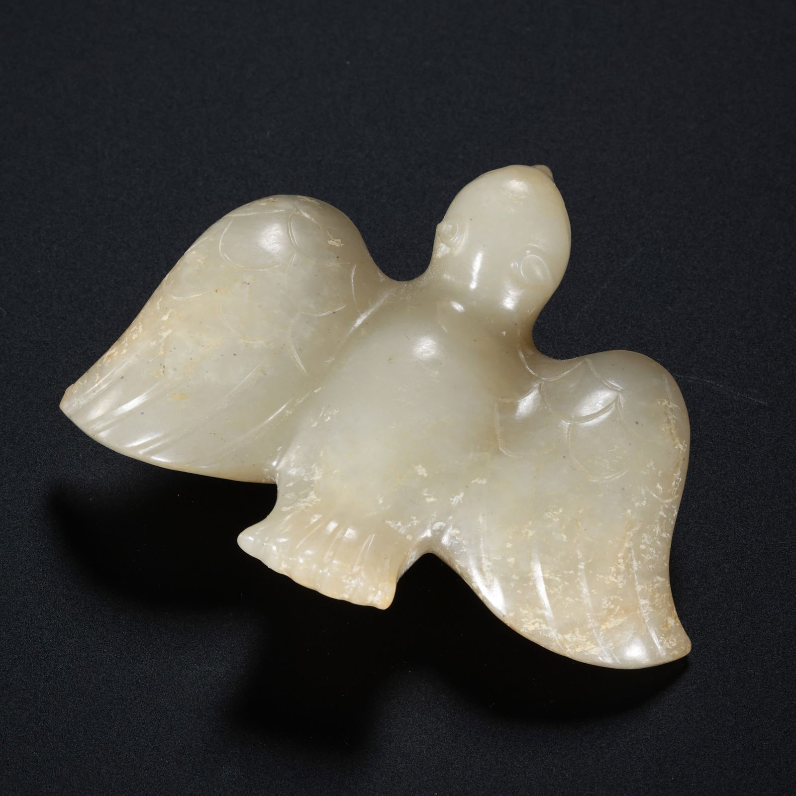 Jade Phoenix from the Han Dynasty in China: L. 6.2 cm. W. 5 cm. Weight. 40 gram.