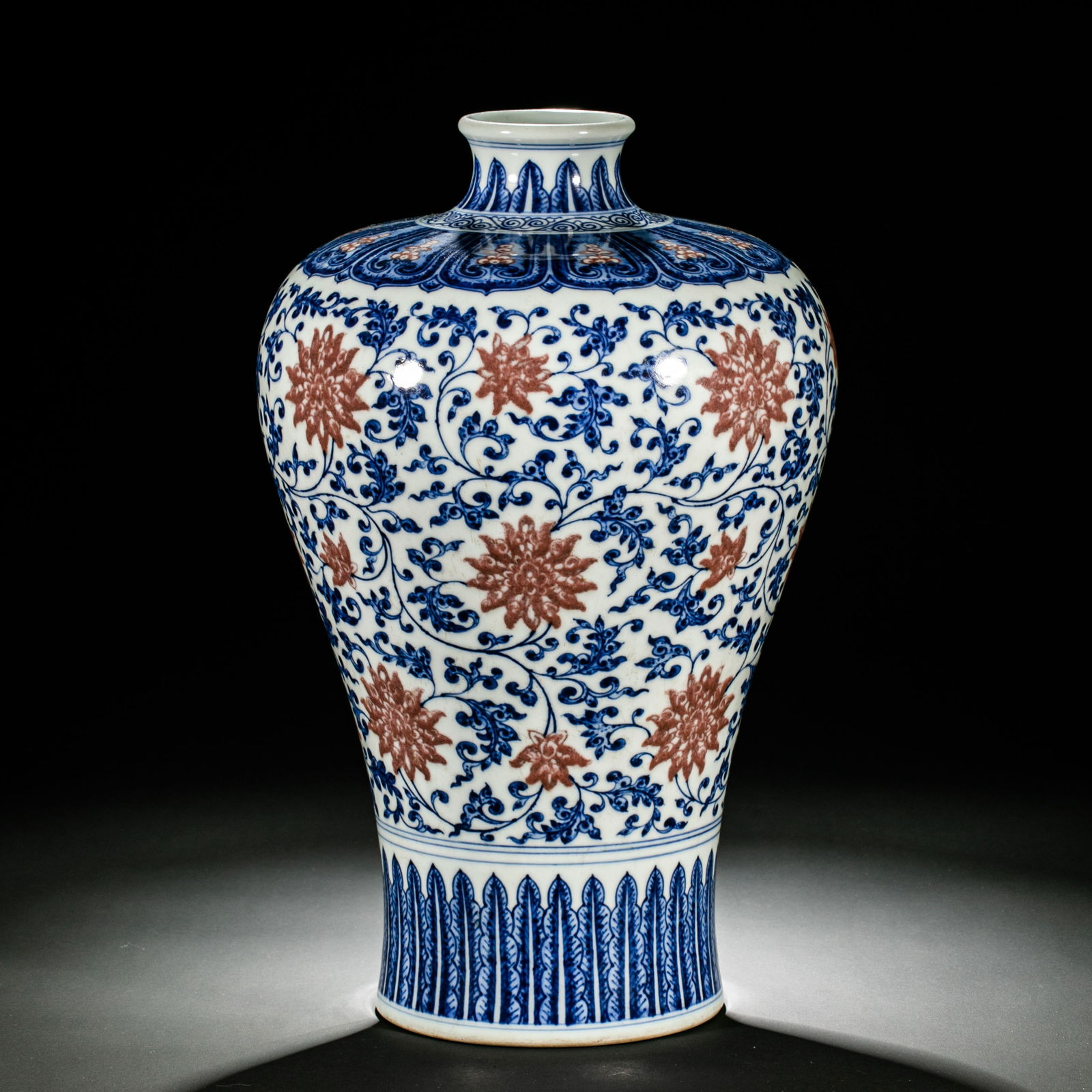 A blue-and-white underglaze red plum vase with scrolling floral design from the Qianlong period of (1 of 7)