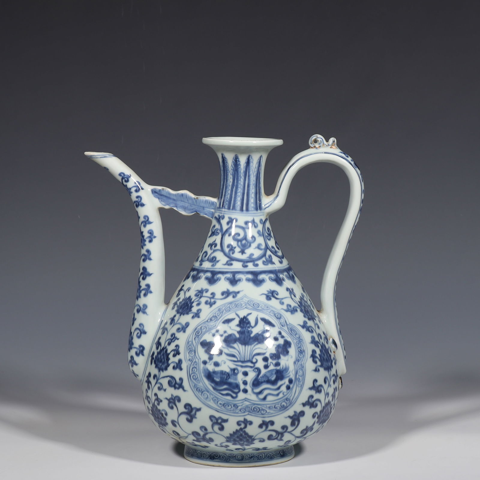 Blue and white porcelain ewer with mandarin duck and water motif from the Xuande period of the Ming (1 of 9)