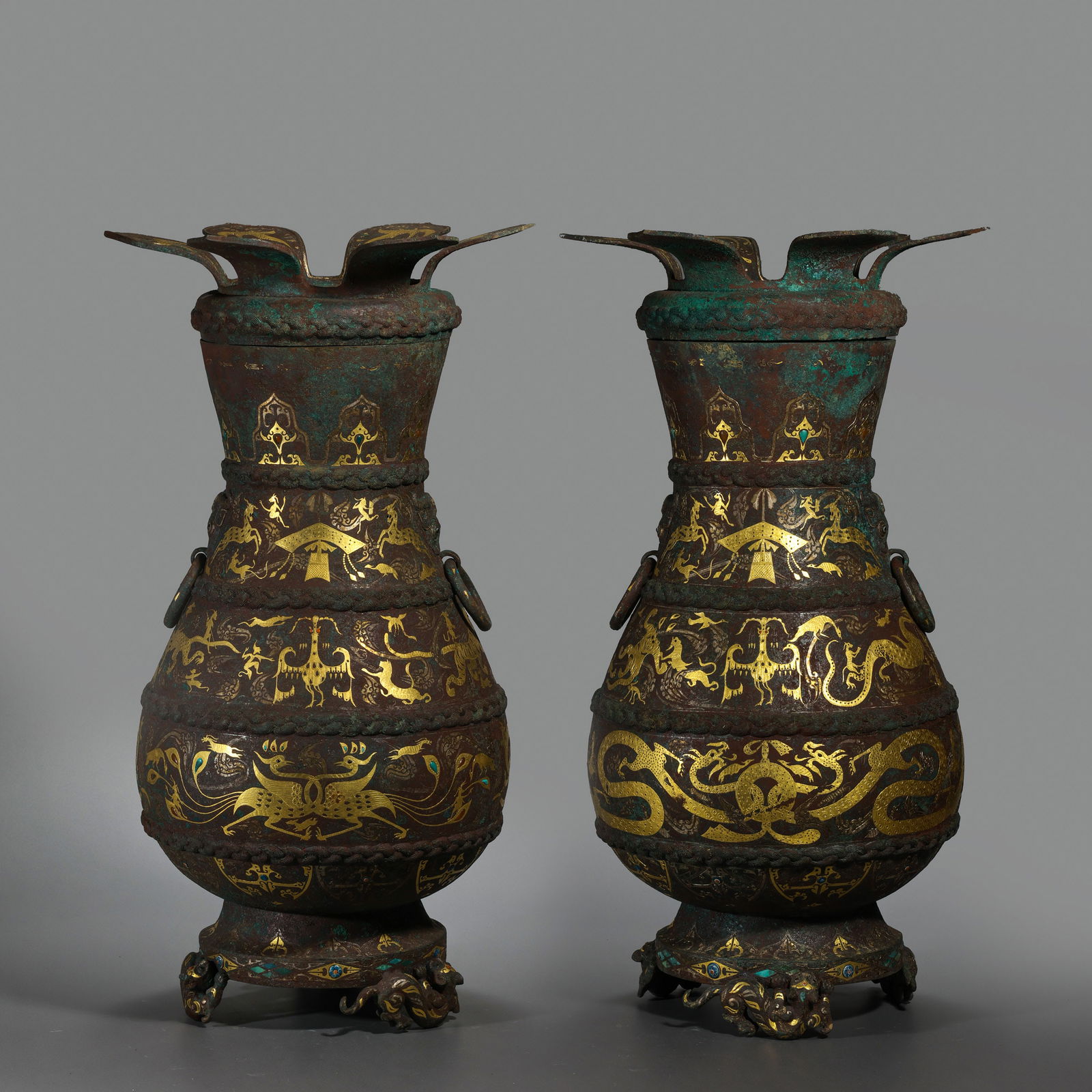 A pair of Chinese Warring States period gold and silver inlaid covered bottles (1 of 20)