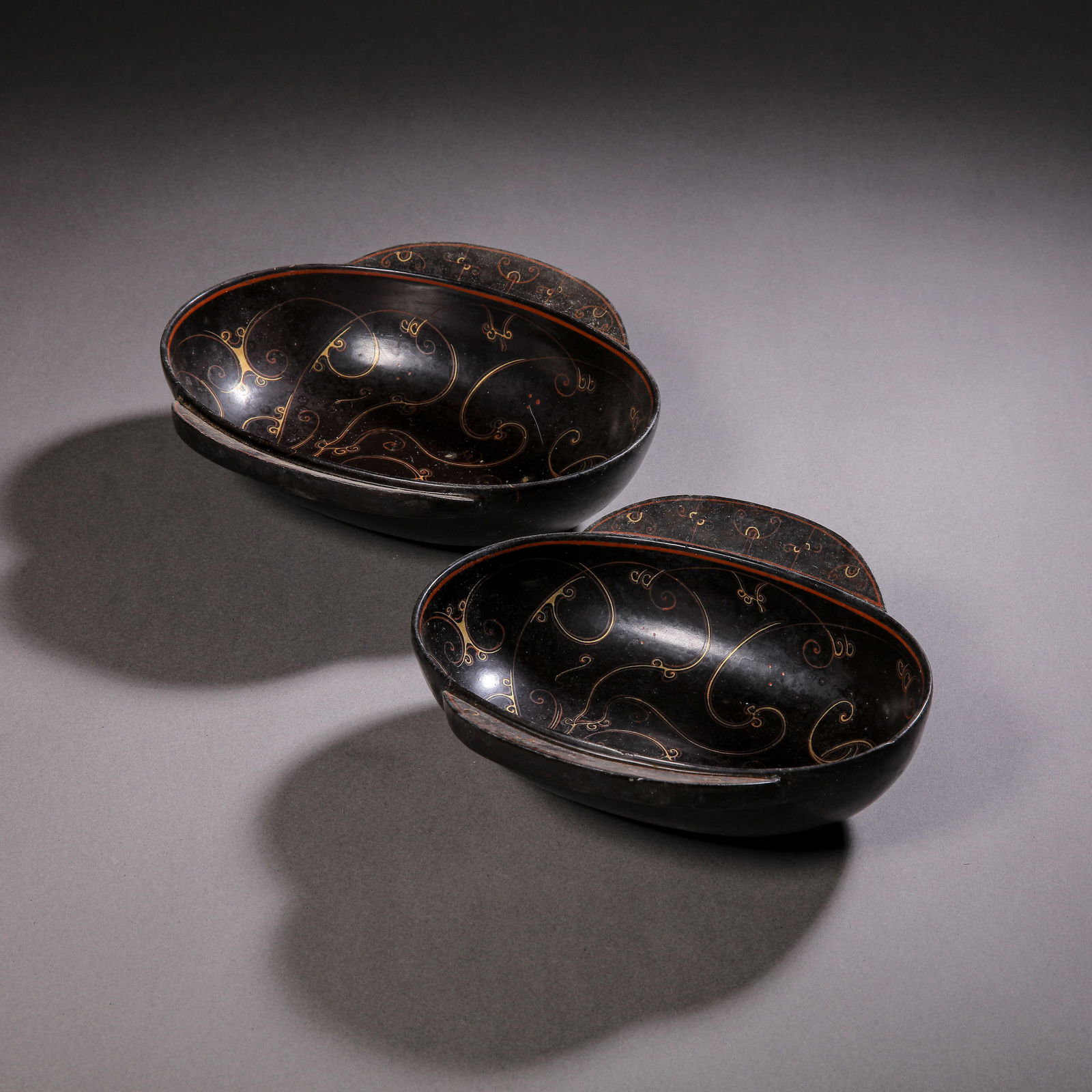 A pair of Chinese Han Dynasty wooden painted ear cups (1 of 8)