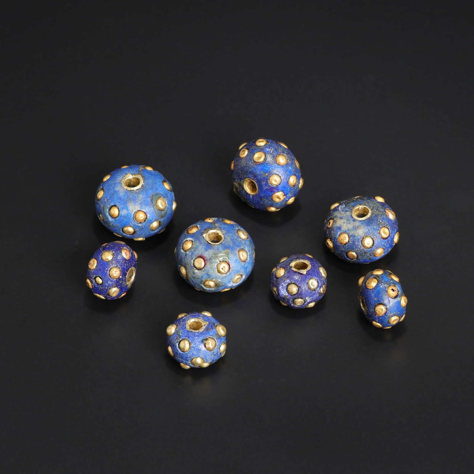 Chinese Han Dynasty Dragonfly Eye Glass Beads: L. 1.3 cm. L. 1.8 cm. Weight. 35 gram.
