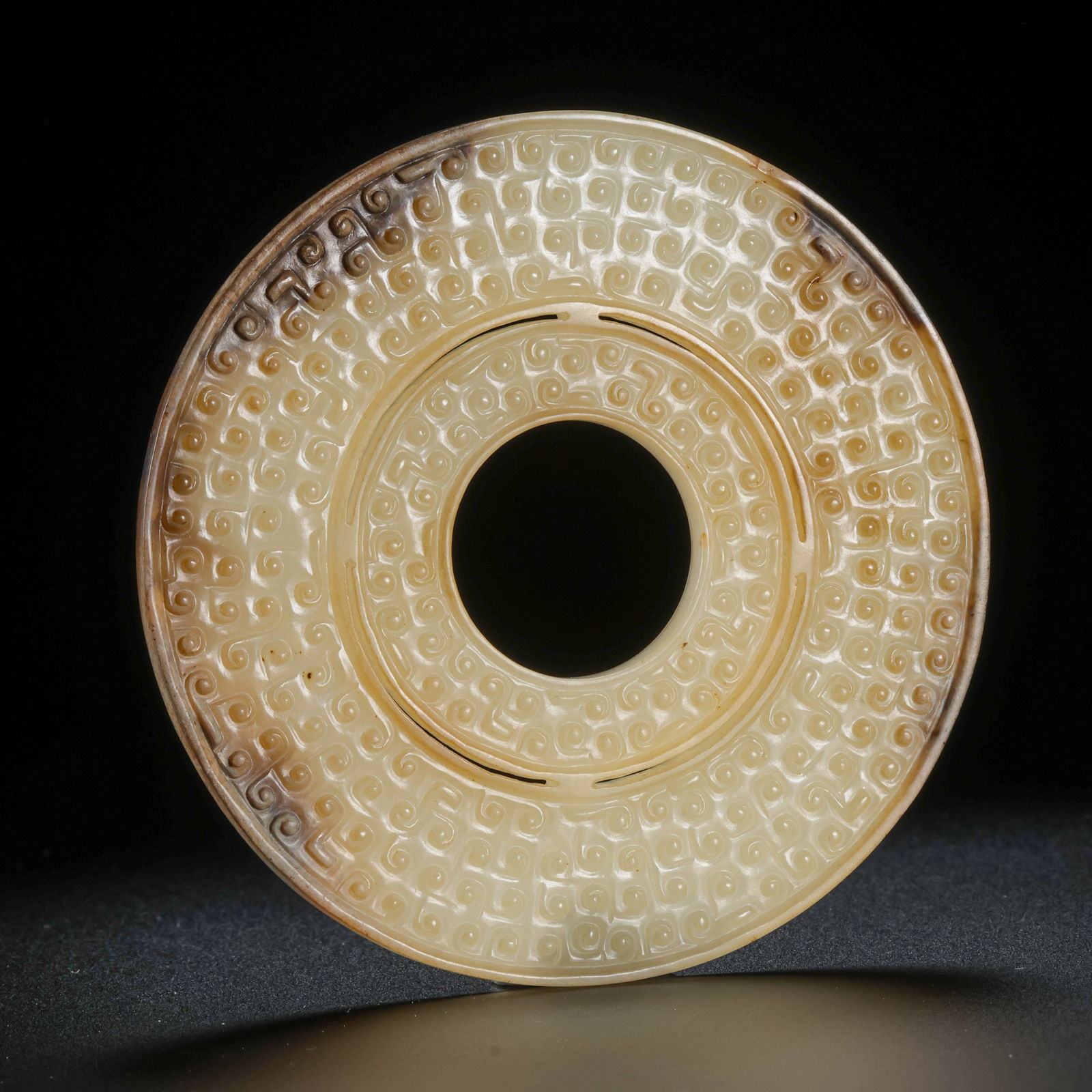 Jade disc with cloud pattern from the Warring States period of China (1 of 8)