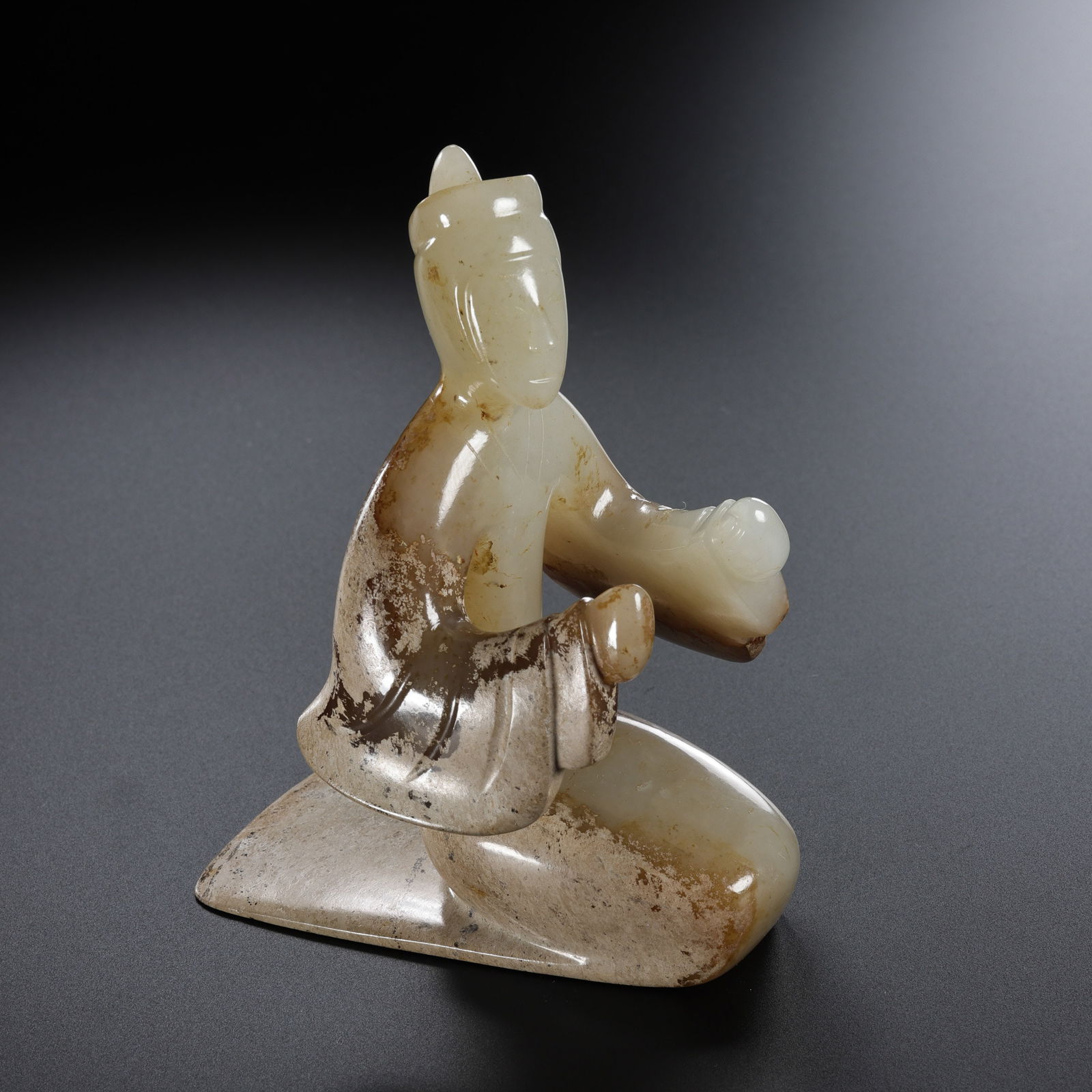 Jade kneeling figure from the Han Dynasty in China (1 of 8)