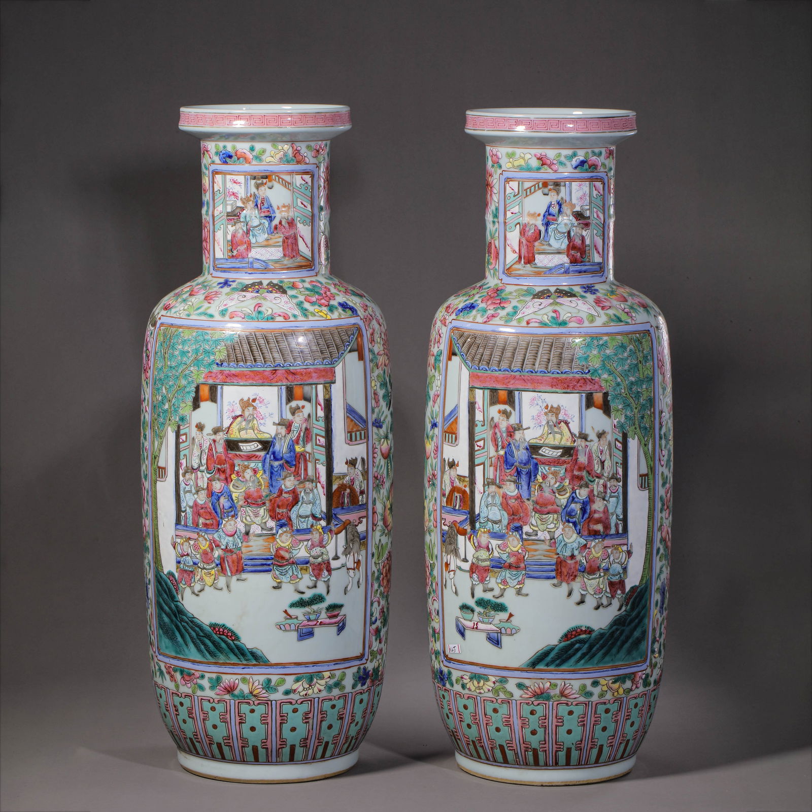 A pair of Chinese Qing Dynasty famille rose vases with figure and story designs (1 of 18)