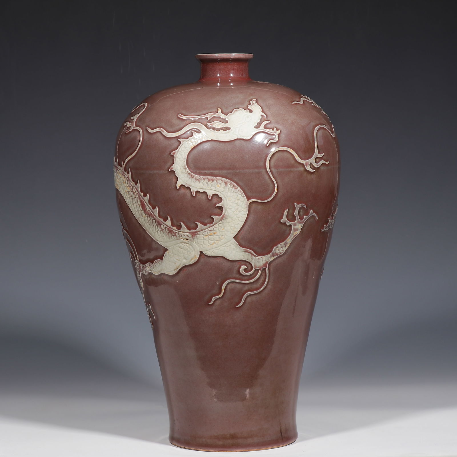 Chinese Yuan Dynasty underglaze red and white dragon pattern plum vase: H. 40 cm. W. 17.5 cm.