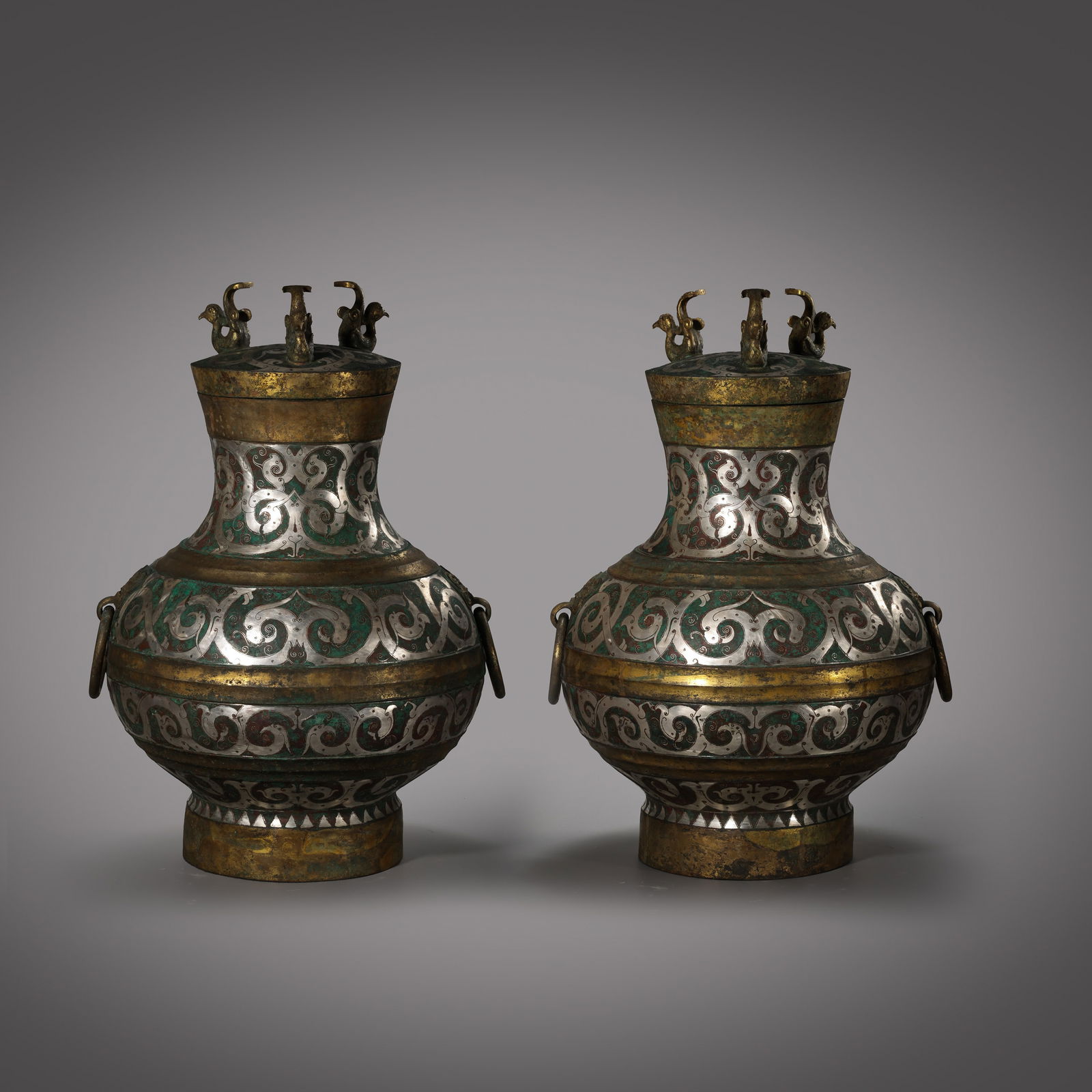 A pair of Chinese Warring States period gold and silver inlaid double-ring handle covered pots (1 of 19)