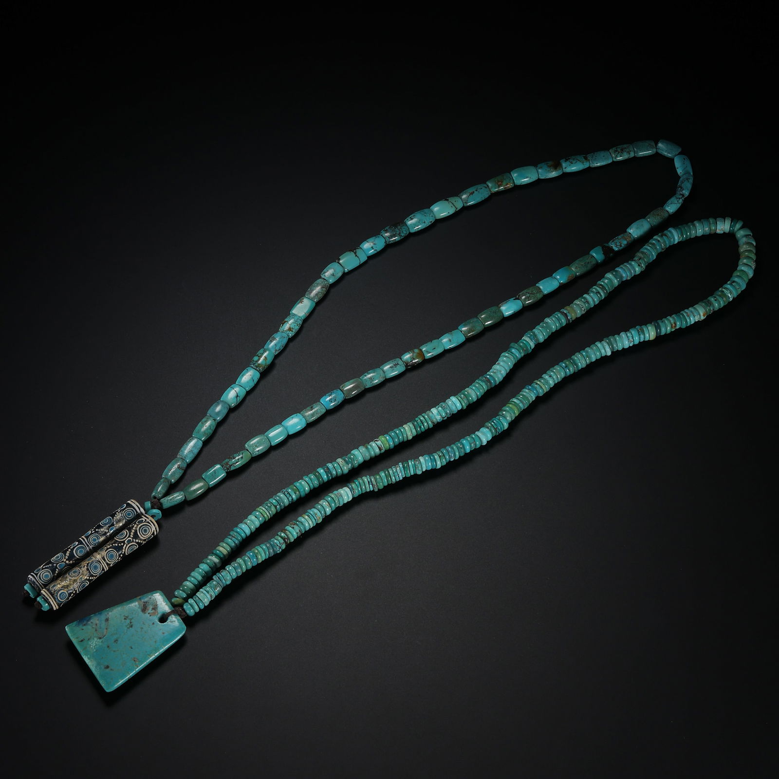 A set of Chinese Han Dynasty turquoise necklaces: L. 6.2 cm. L. 4.7 cm. Weight. 161.1 gram.