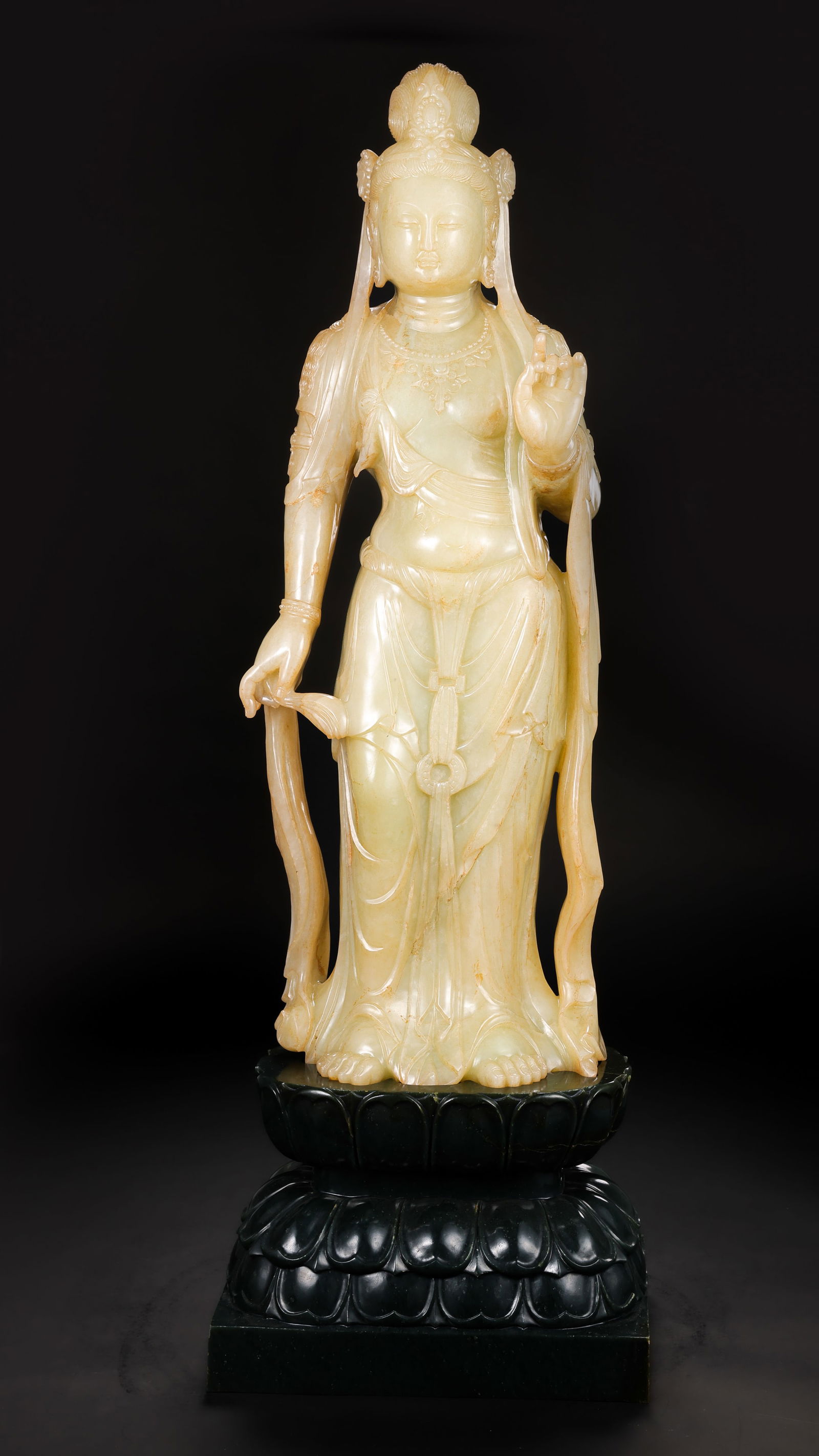 Standing Guanyin statue made of Hetian jade from the Northern Wei Dynasty in China: H. 69 cm. H. 53 cm. W. 22 cm. Weight. 21800 gram.