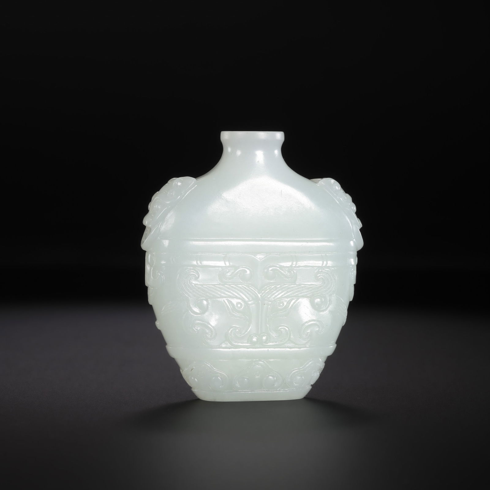 Chinese Qing Dynasty Hetian white jade snuff bottle with animal face design (1 of 11)