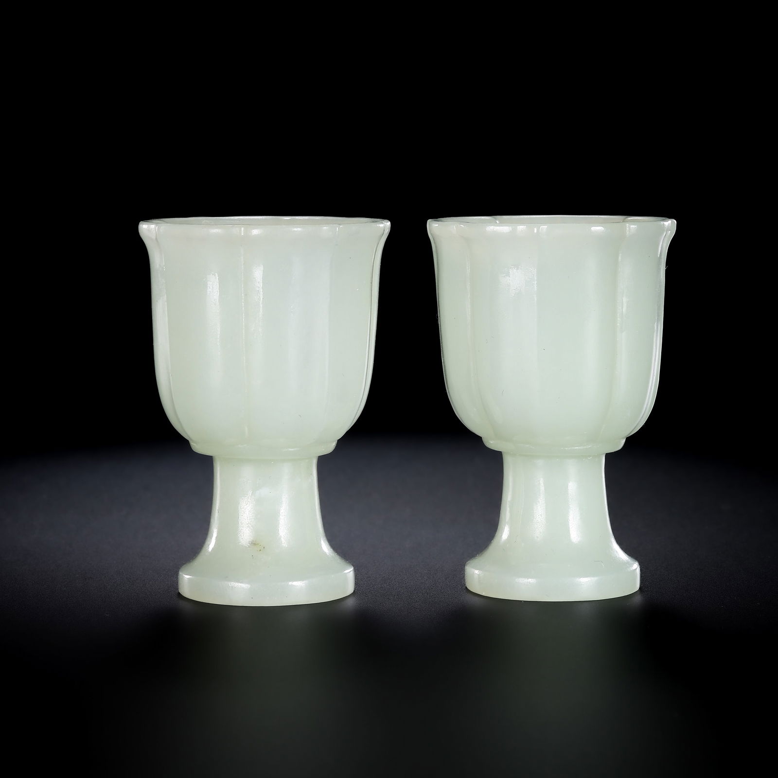 pair of Chinese Qing Dynasty Hetian white jade cups (1 of 9)