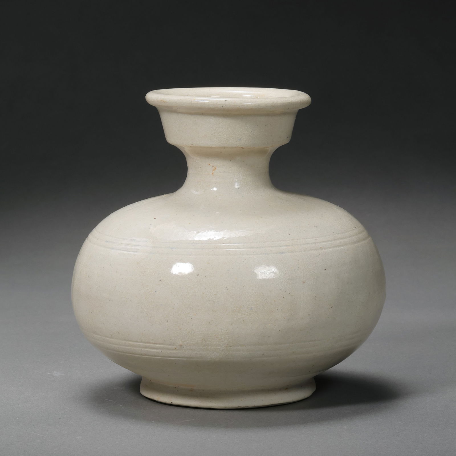 White porcelain bottle with flared mouth from Gongxian kiln, Tang Dynasty, China (1 of 6)