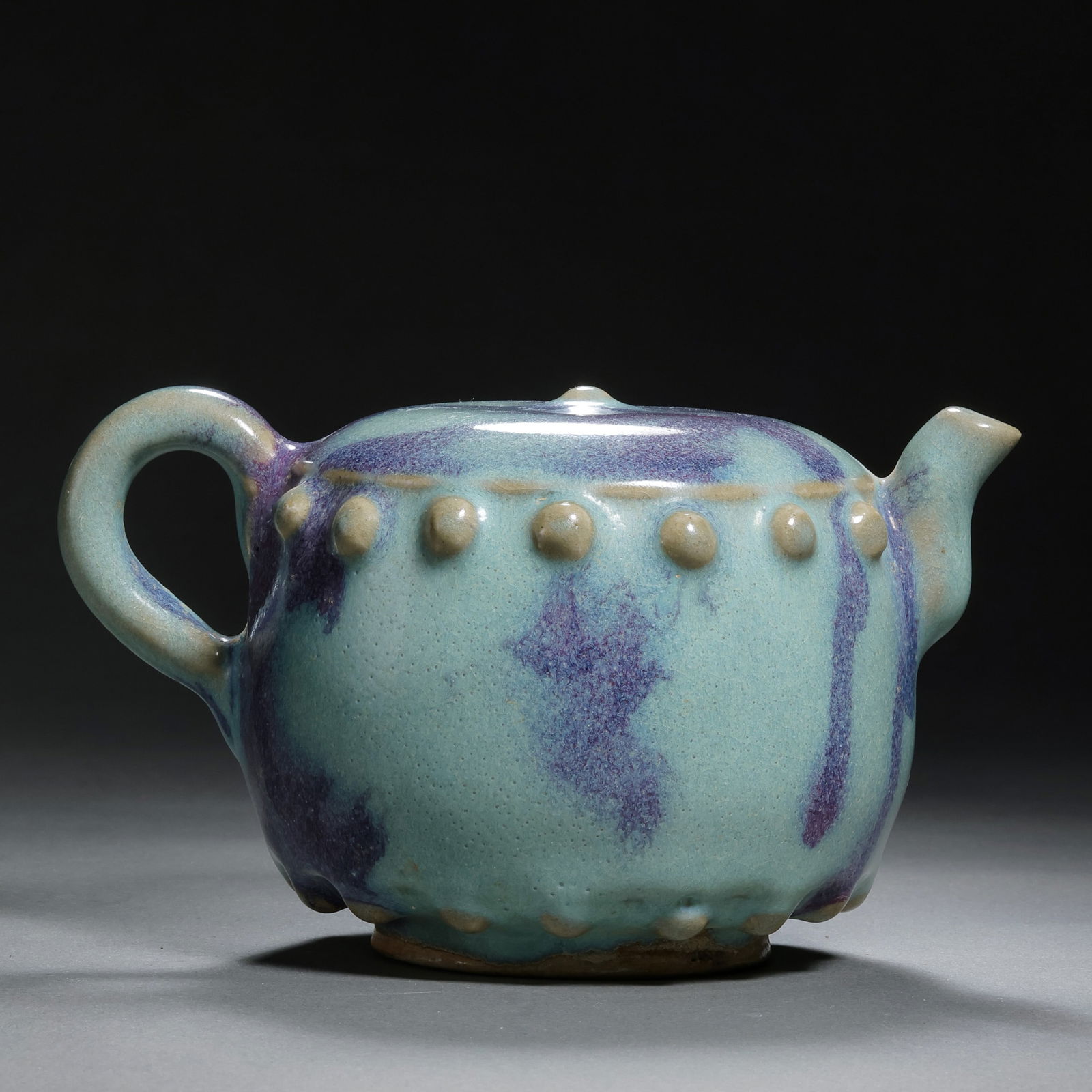 A Northern Song Dynasty Jun ware ewer with sky-blue glaze and red drum-nail decoration. (1 of 9)