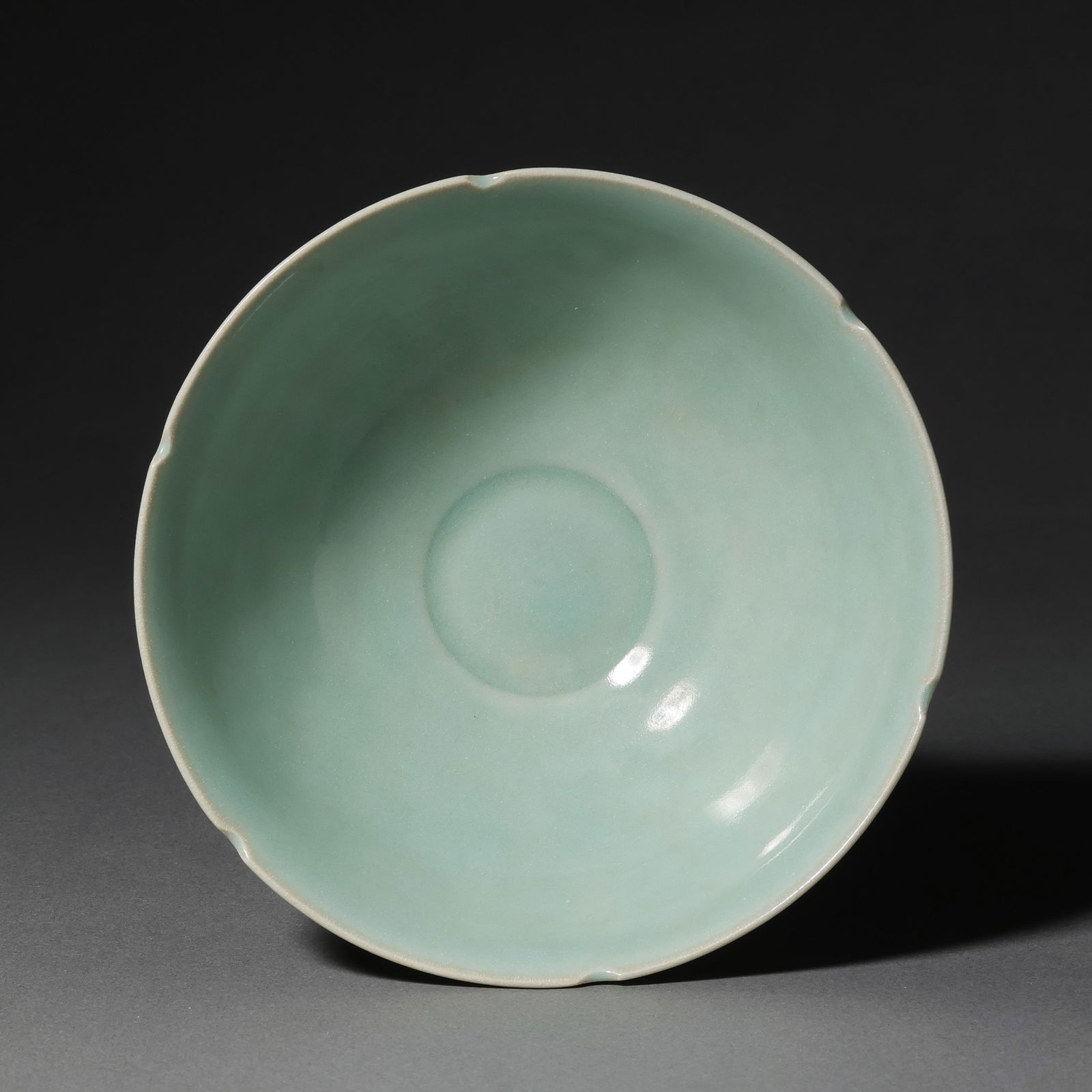 Southern Song Dynasty Longquan kiln celadon flower-shaped bowl: H. 6.2 cm. Diam. 14.2 cm.