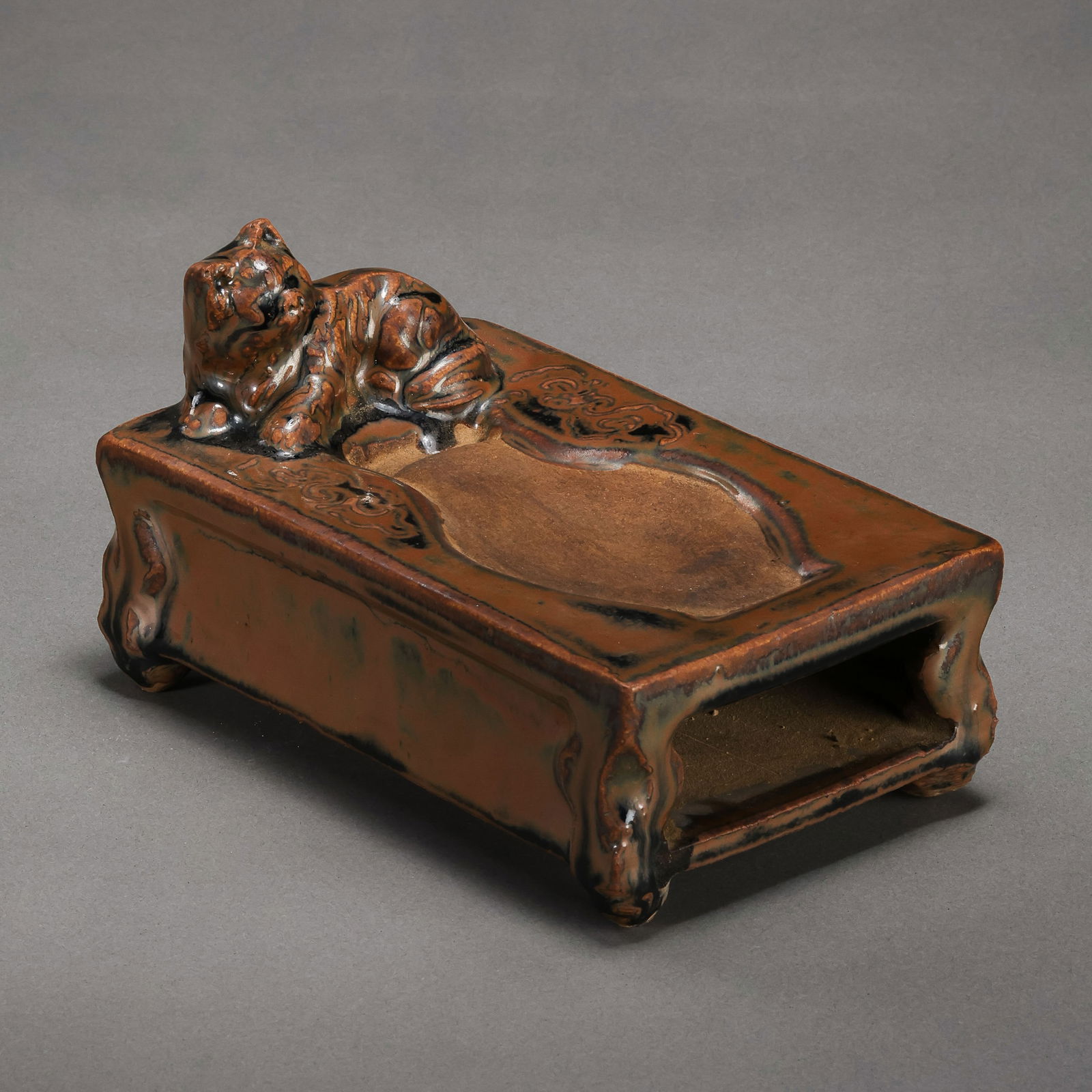 Purple-Gold Glazed Inkstone from Cizhou Kiln, Northern Song Dynasty, China: H. 10.5 cm. L. 16 cm. W. 10 cm.