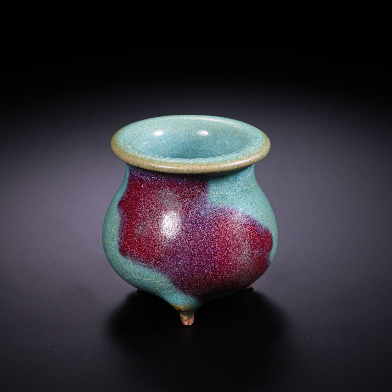 three-legged censer with sky-blue glaze and red trim from the Jun kiln of the Northern Song Dynasty: H. 5.5 cm. Diam. 4.7 cm.