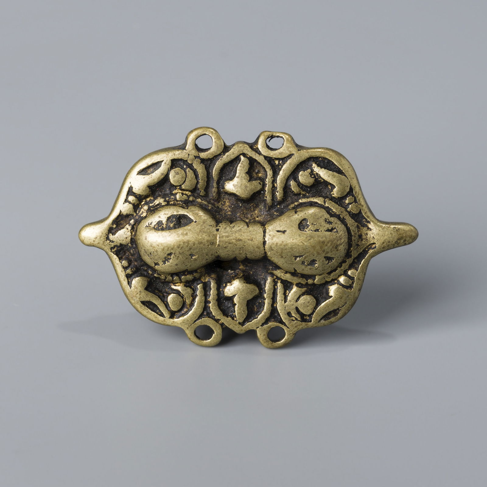 West Asian copper accessories: L. 5.2 cm. W. 3.4 cm. Weight. 49 gram.