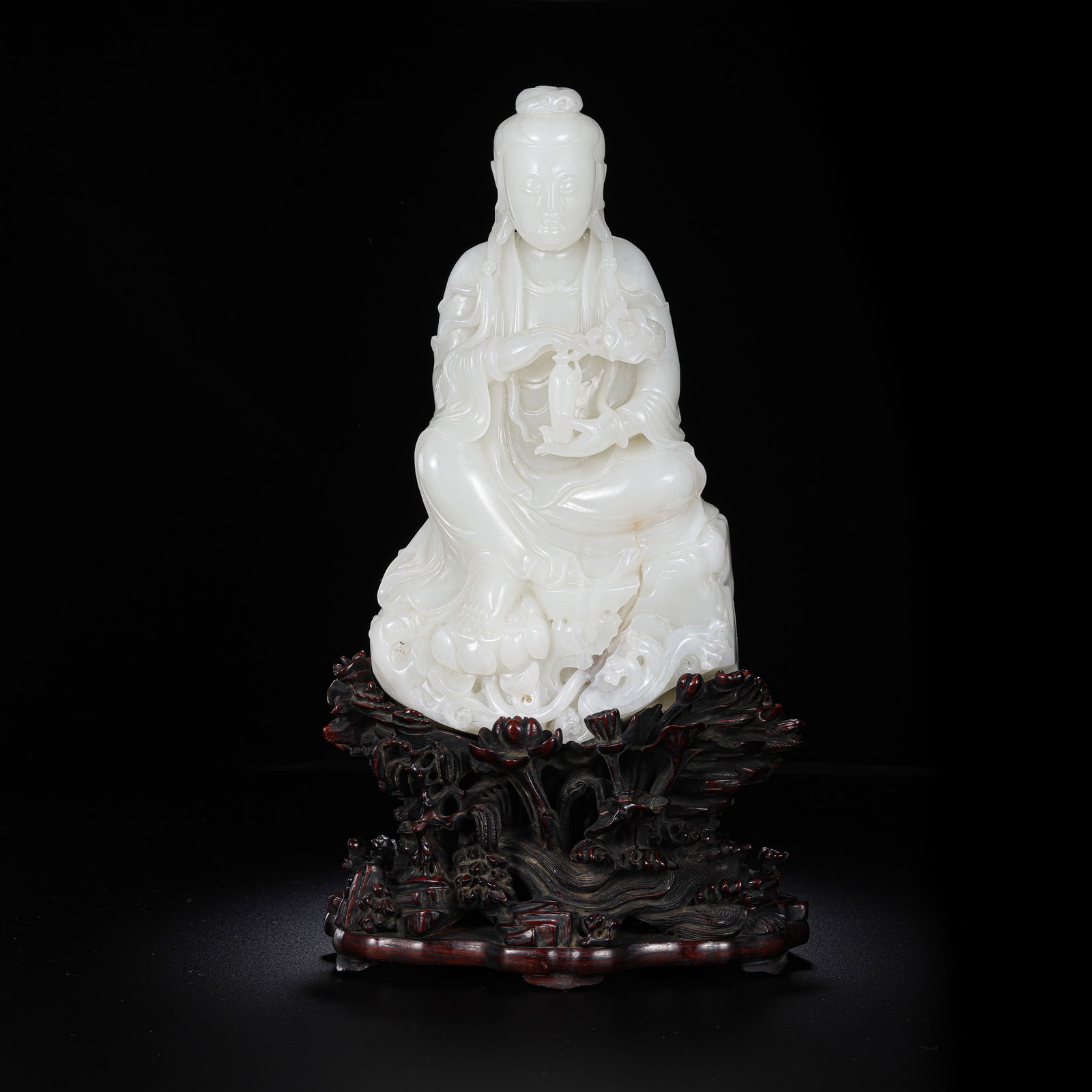 Chinese Qing Dynasty Hetian white jade Guanyin seated statue: H. 30 cm. W. 15.5 cm. Weight. 2716 gram.