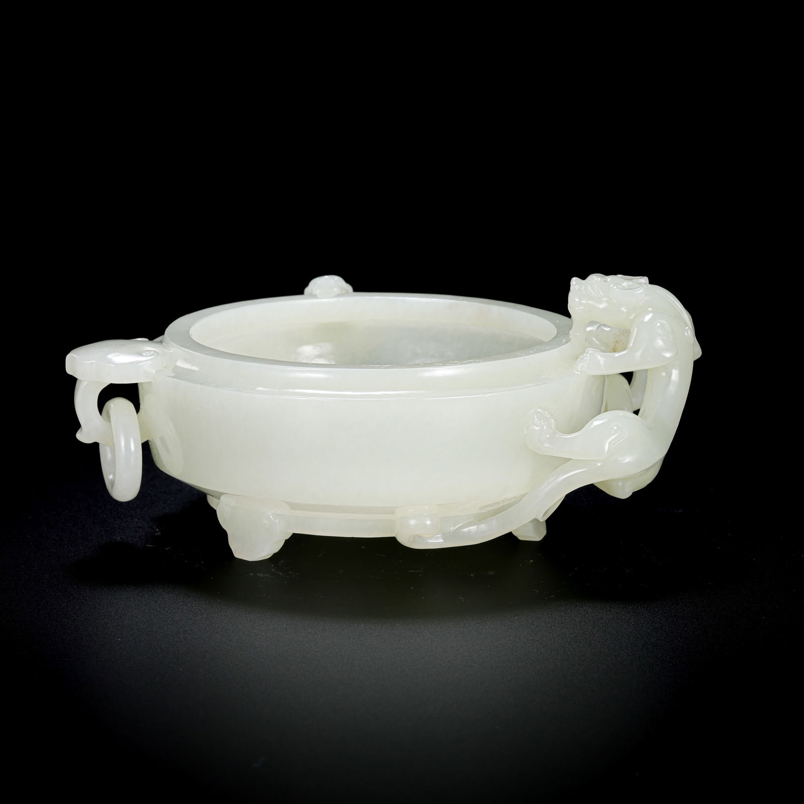 Chinese Qing Dynasty Hetian white jade dragon-handled ring-eared tripod censer: H. 5.5 cm. L. 13 cm. Weight. 255.5 gram.