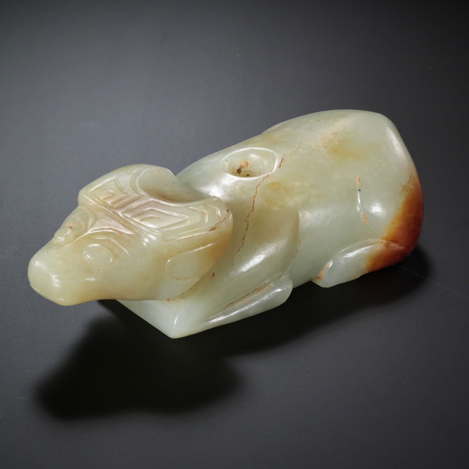 Jade Ox from the Western Zhou Dynasty in China: H. 3 cm. L. 11.5 cm. Weight. 254 gram.