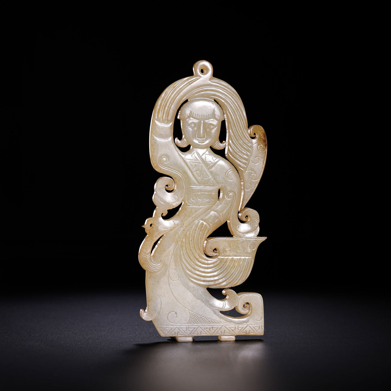 Jade dancer from the Han Dynasty in China: L. 8.5 cm. W. 3.7 cm. Weight. 23 gram.