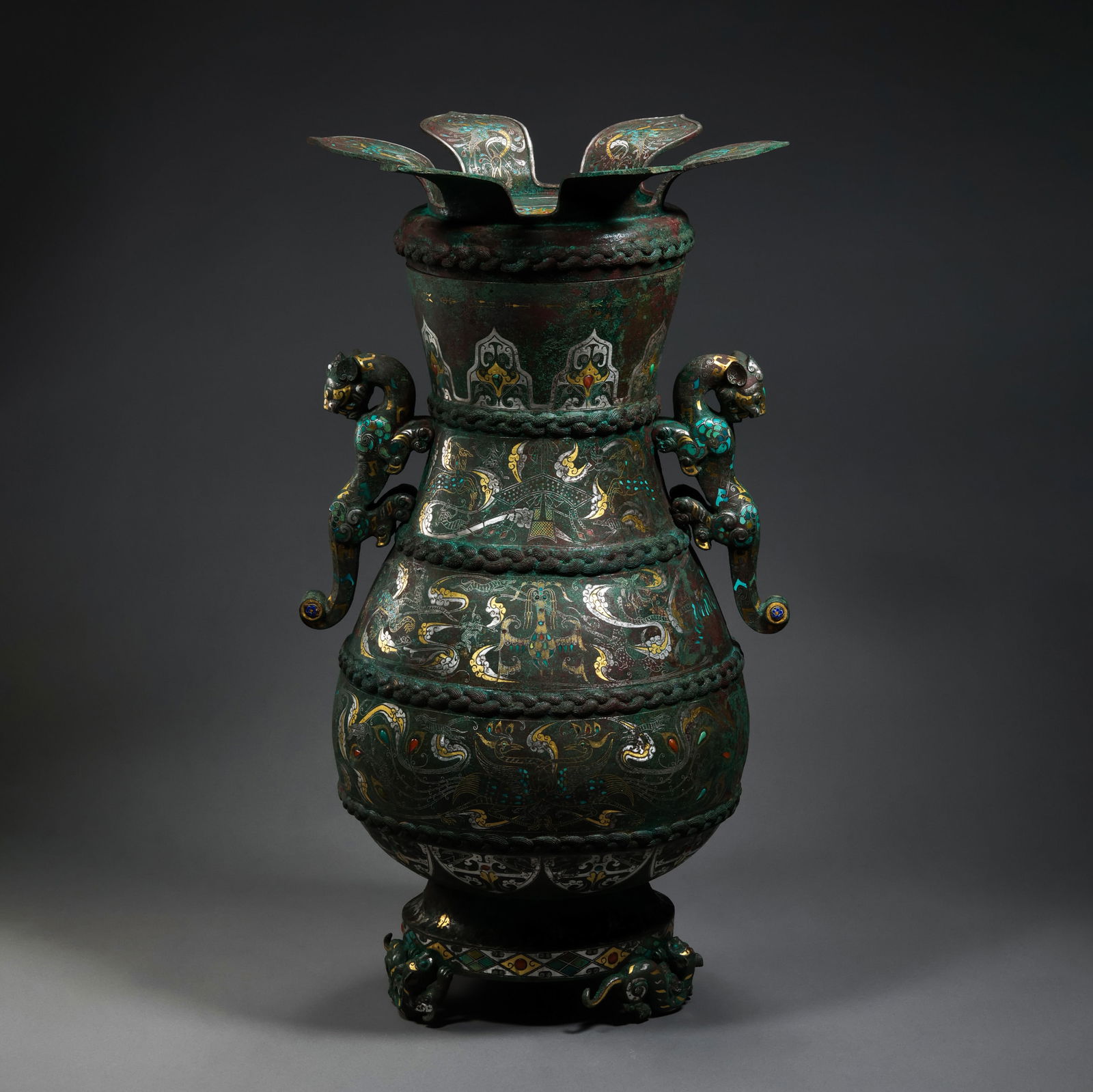 A double-eared vase with inlaid gold and silver flowers from the Warring States period of China: /