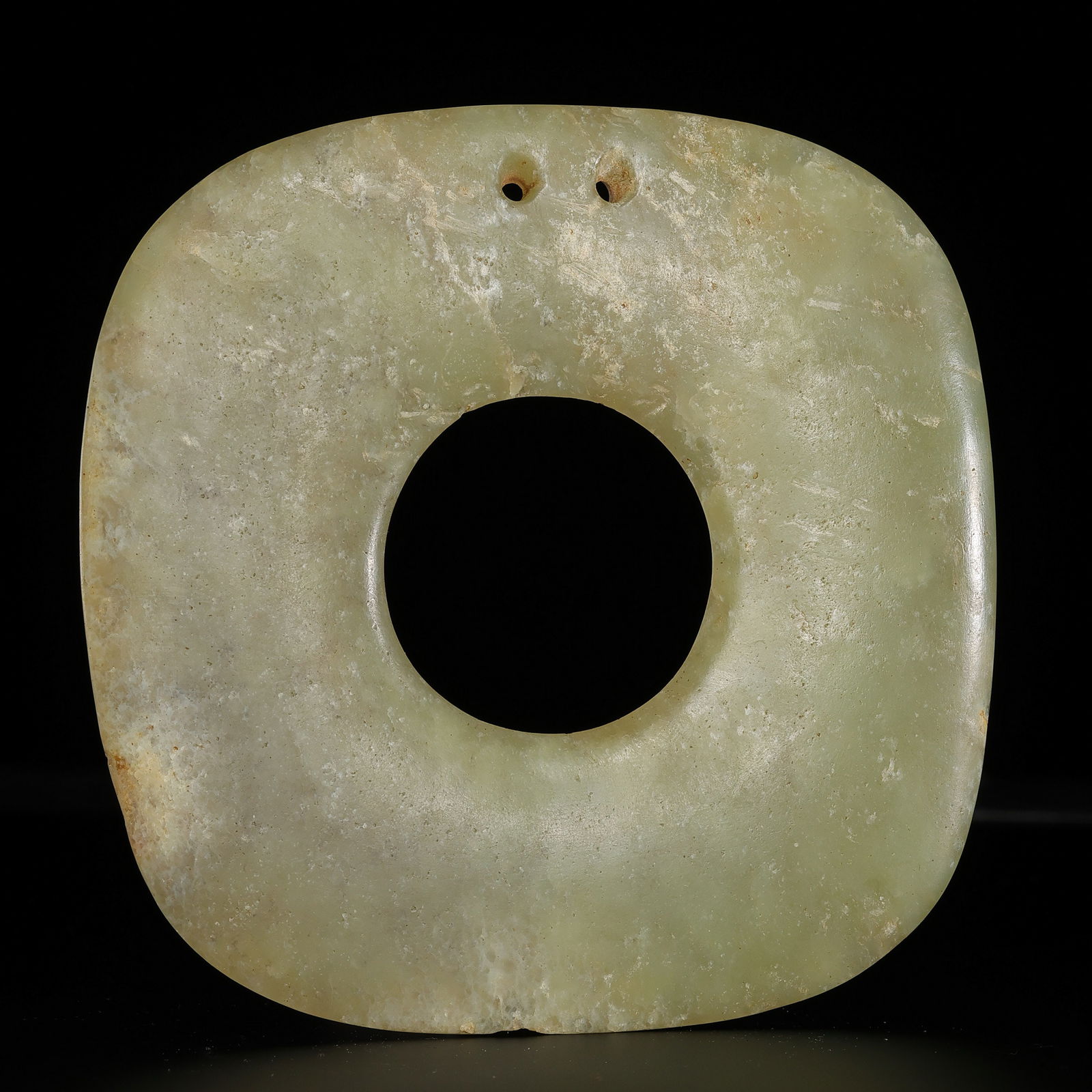Four-sided jade disc from the Hongshan Culture of the Hongshan Period in China: L. 12.5 cm. Weight. 214 gram.