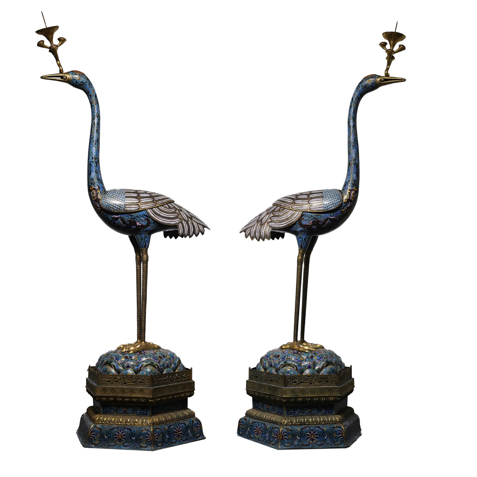 A pair of Chinese Qing Dynasty cloisonné crane-shaped candlesticks: H. 196 cm. W. 85 cm.