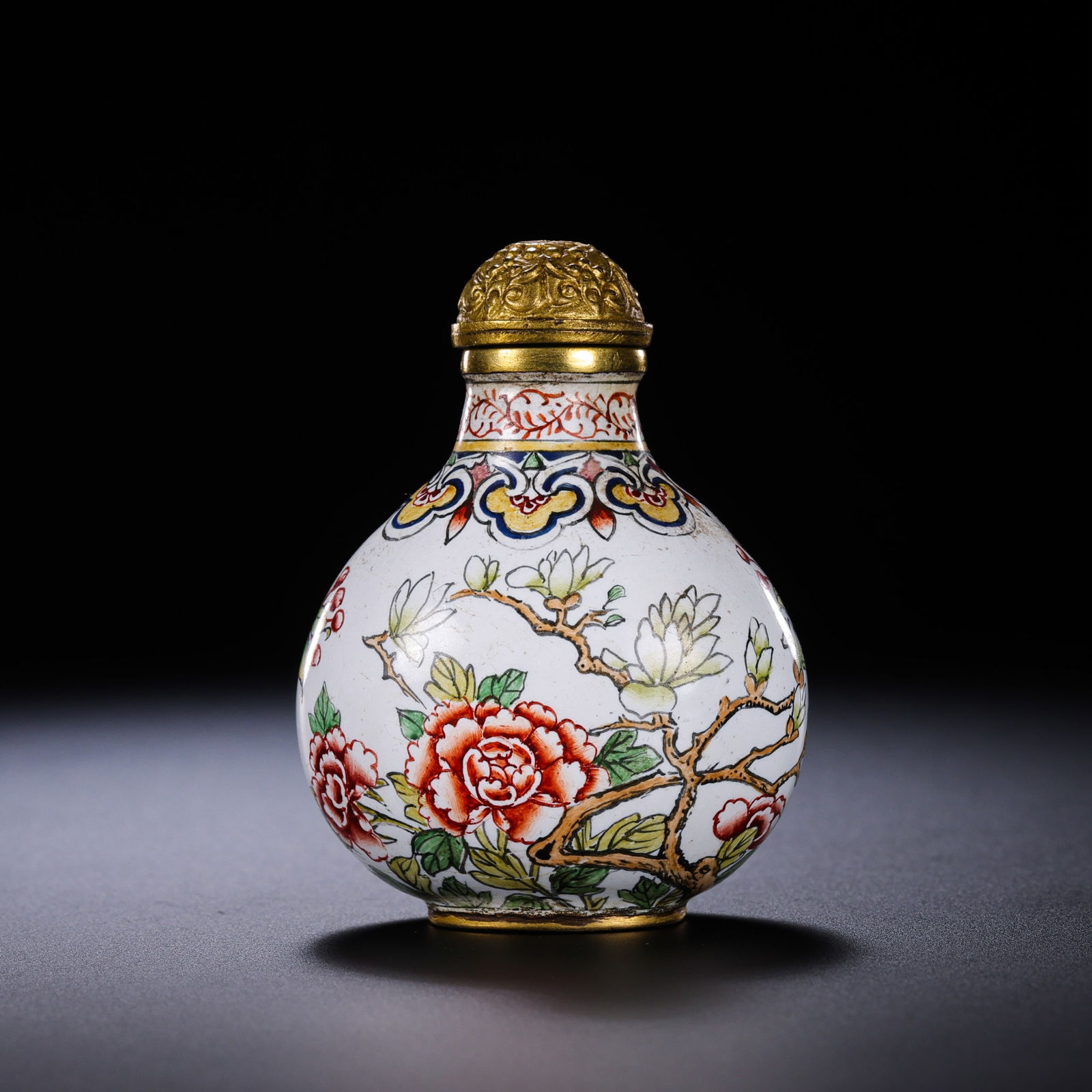 Chinese Qing Dynasty Enamel Snuff Bottle with Floral and Bird Design: H. 5 cm. W. 3.8 cm. Weight. 45 gram.