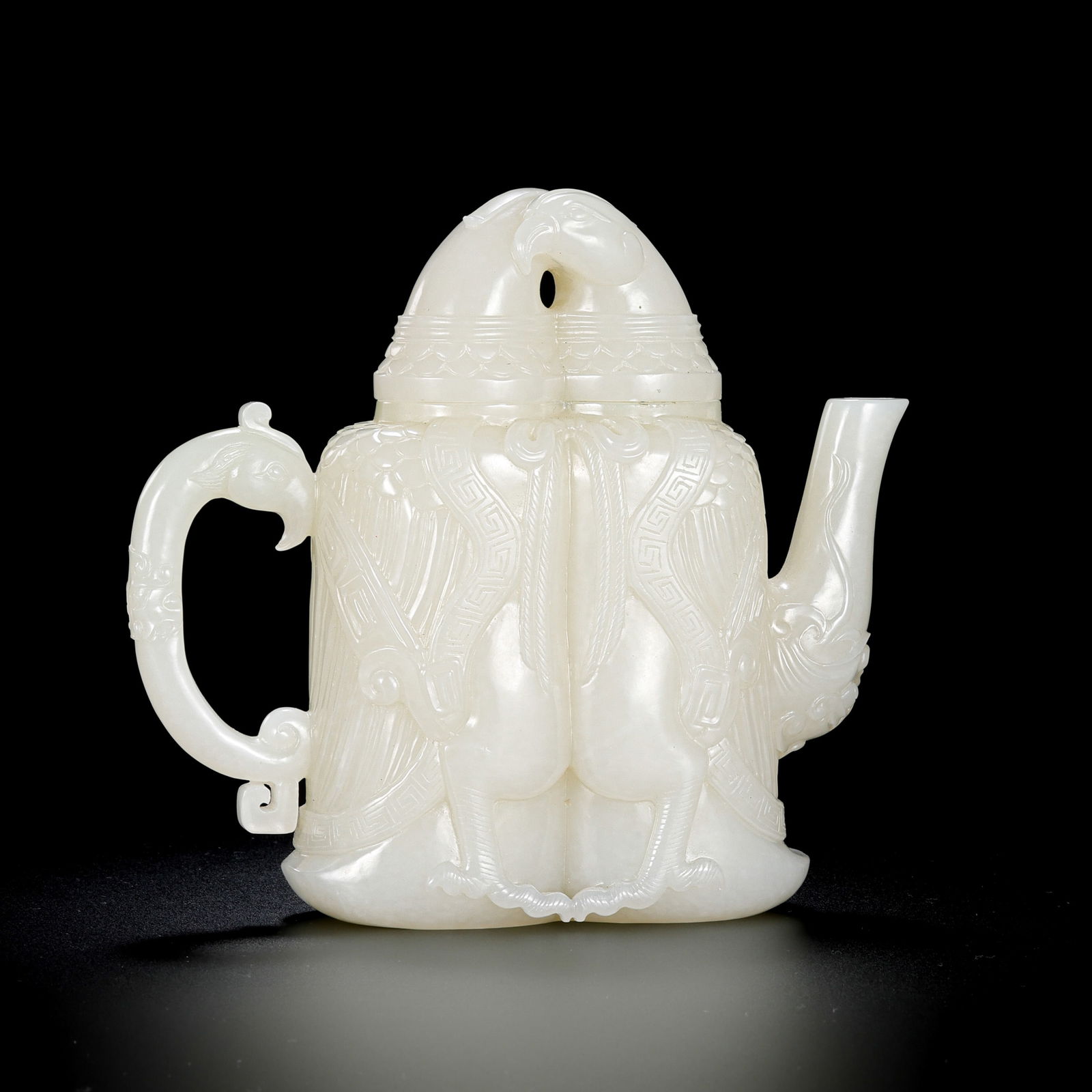 Chinese Qing Dynasty Hetian white jade ewer: H. 14 cm. W. 14.5 cm. Weight. 643.5 gram.
