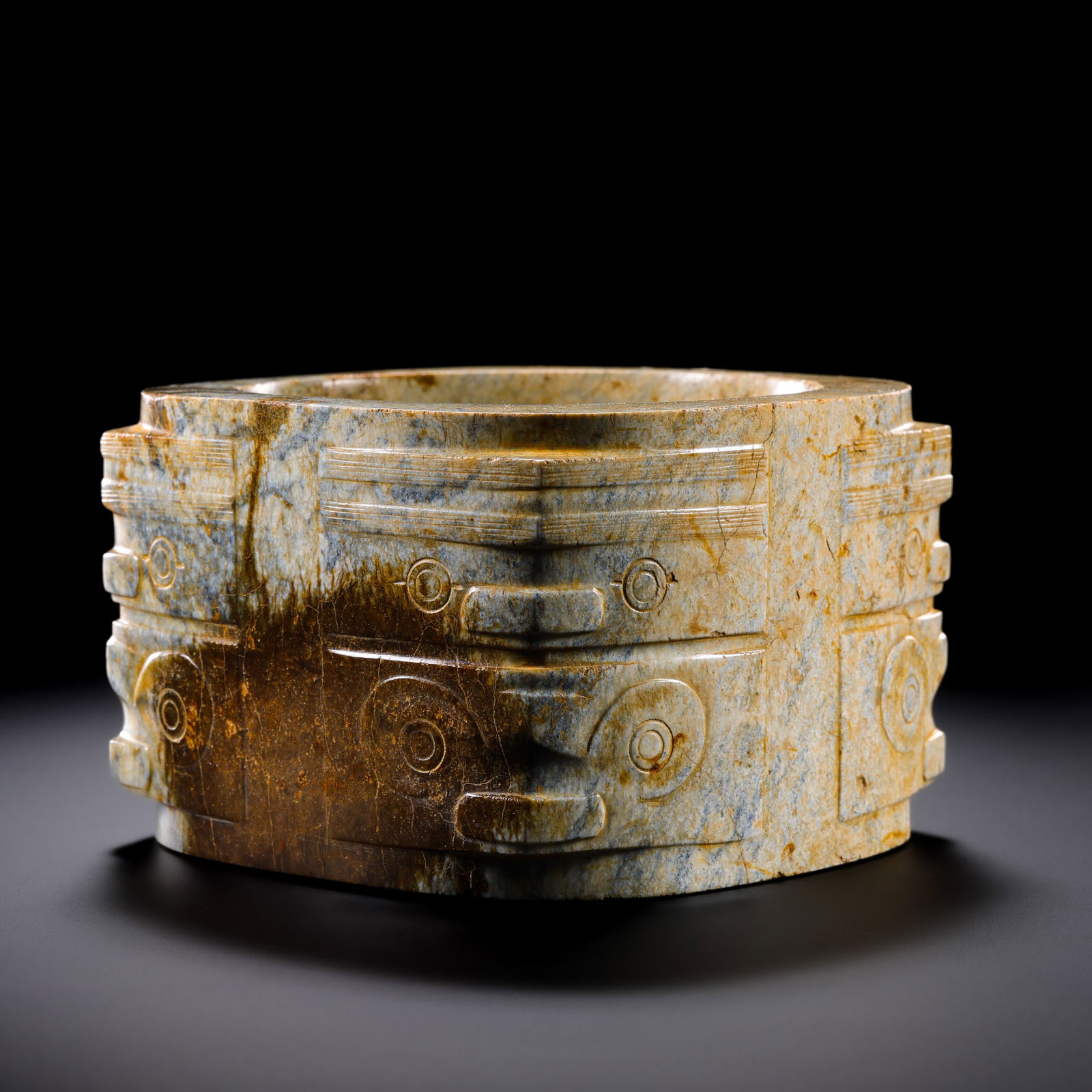 Jade Cong with Animal Mask Pattern from the Neolithic Period in China: H. 6.2 cm. W. 9.5 cm. Weight. 623 gram.