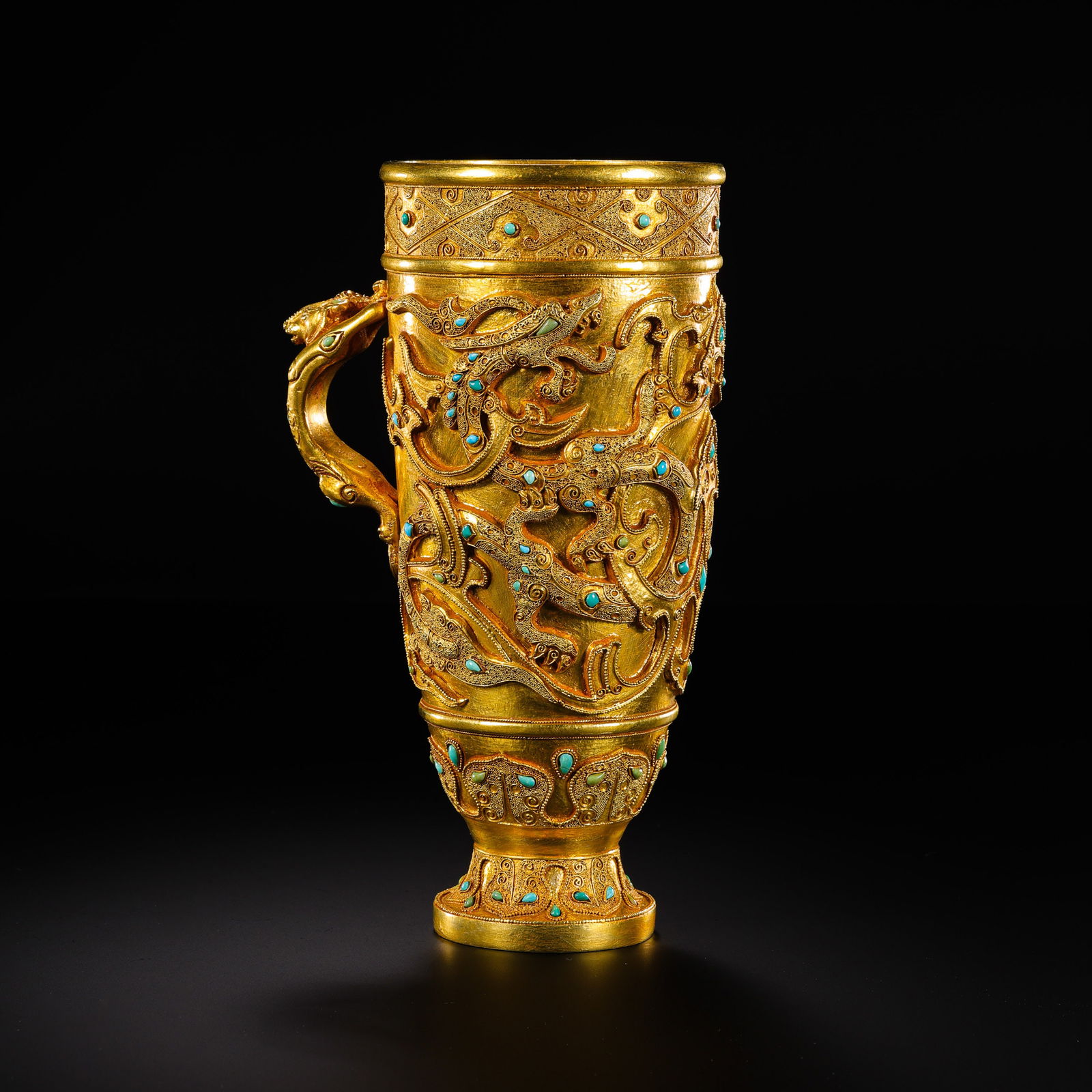 Chinese Han Dynasty pure gold cup inlaid with turquoise dragon design: H. 15 cm. W. 8.5 cm. Weight. 465 gram.