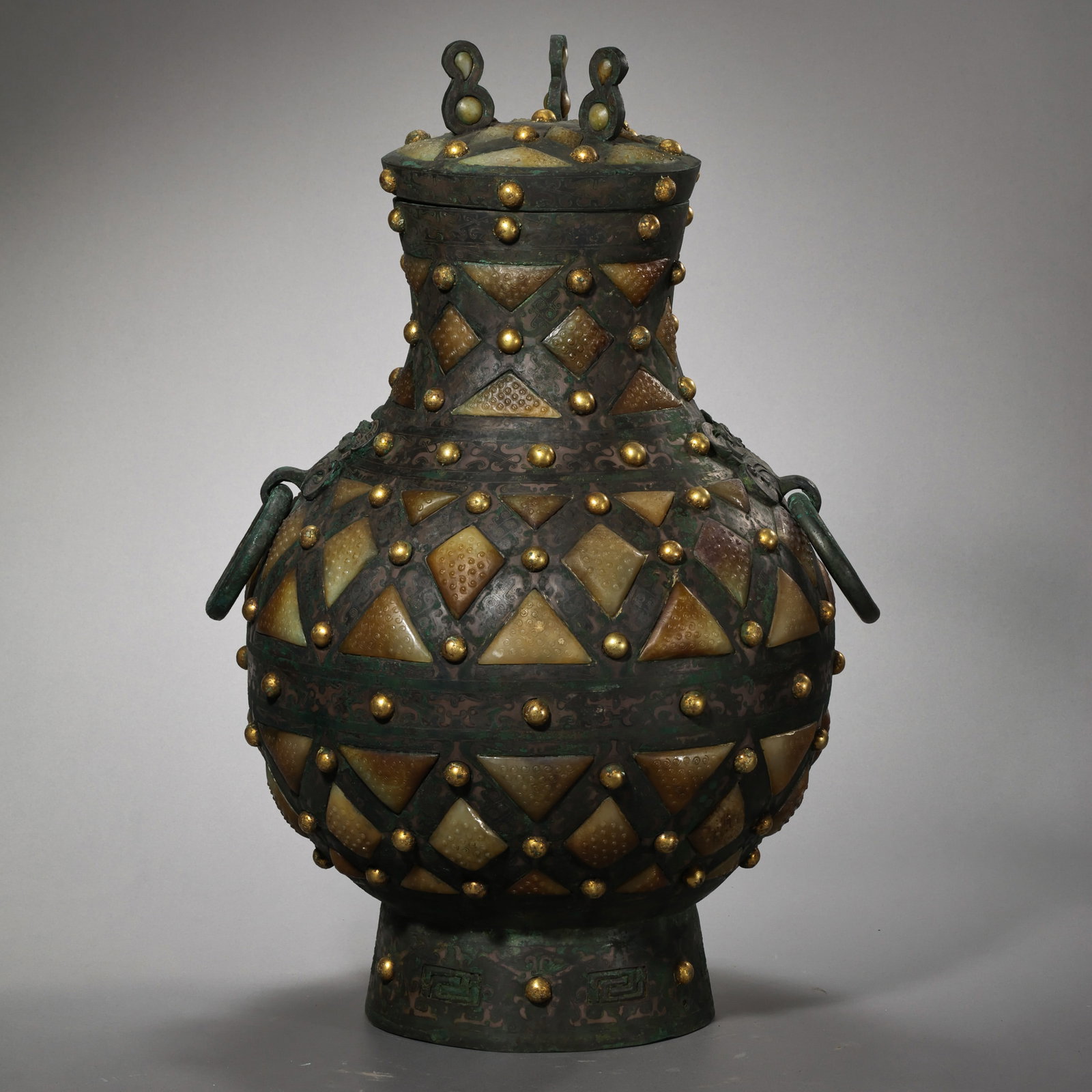A covered ewer from the Warring States period of China, inlaid with gold and silver and Hetian jade.: H. 41.4 cm. Weight. 9900 gram.