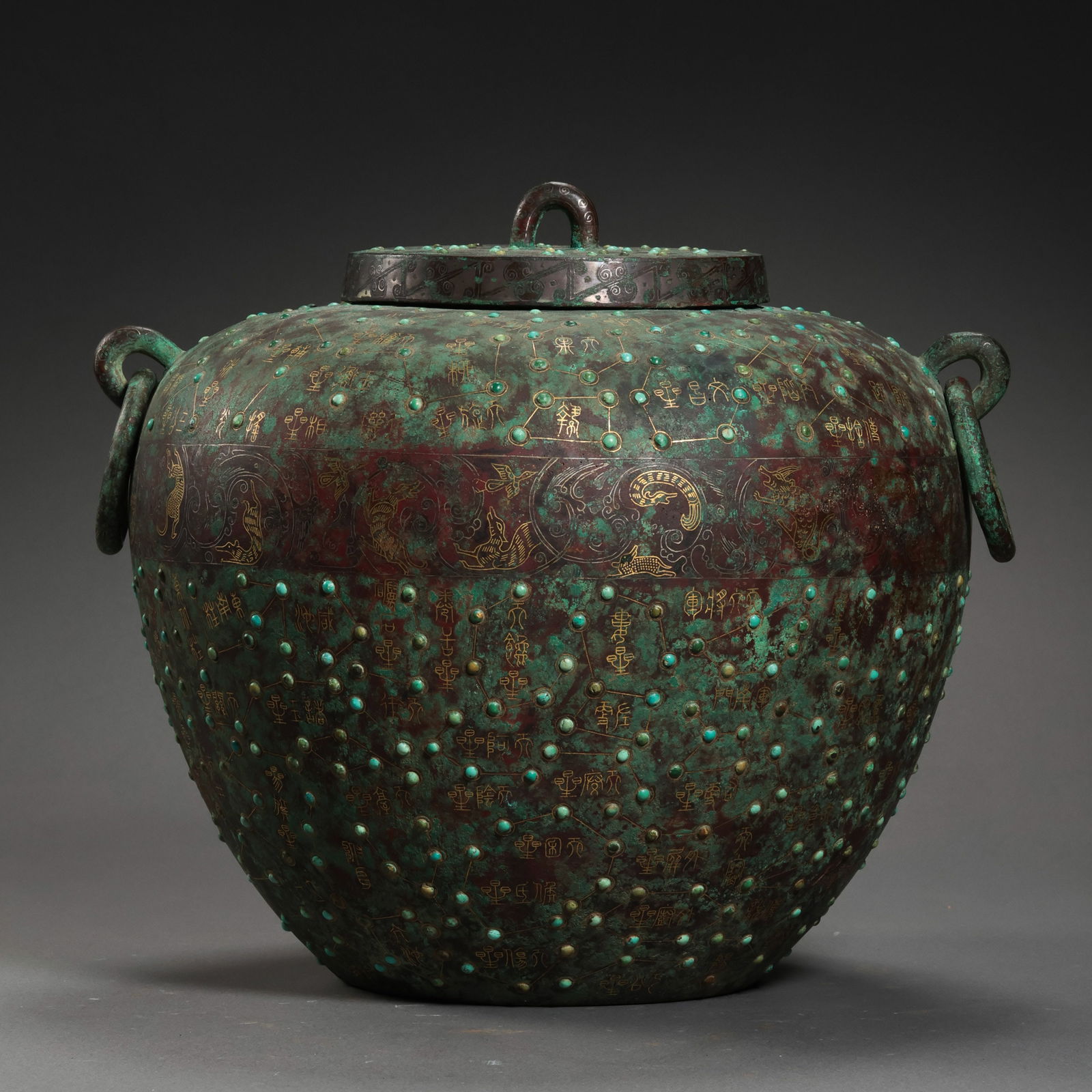 A double-ringed covered jar with inlaid gold and silver and turquoise from the Warring States period: /