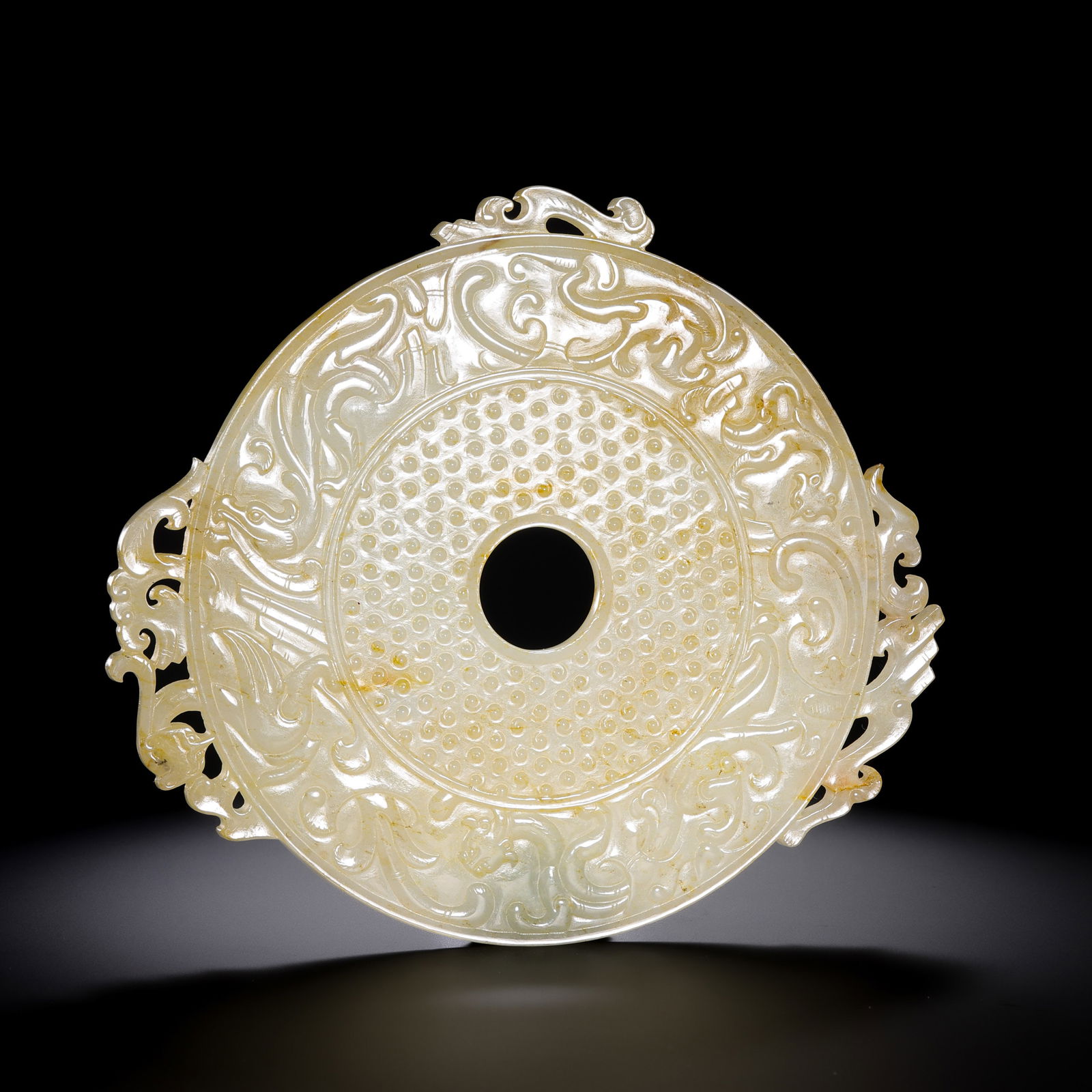 Jade disc from the Han Dynasty in China: H. 14.2 cm. W. 16 cm. Weight. 200 gram.
