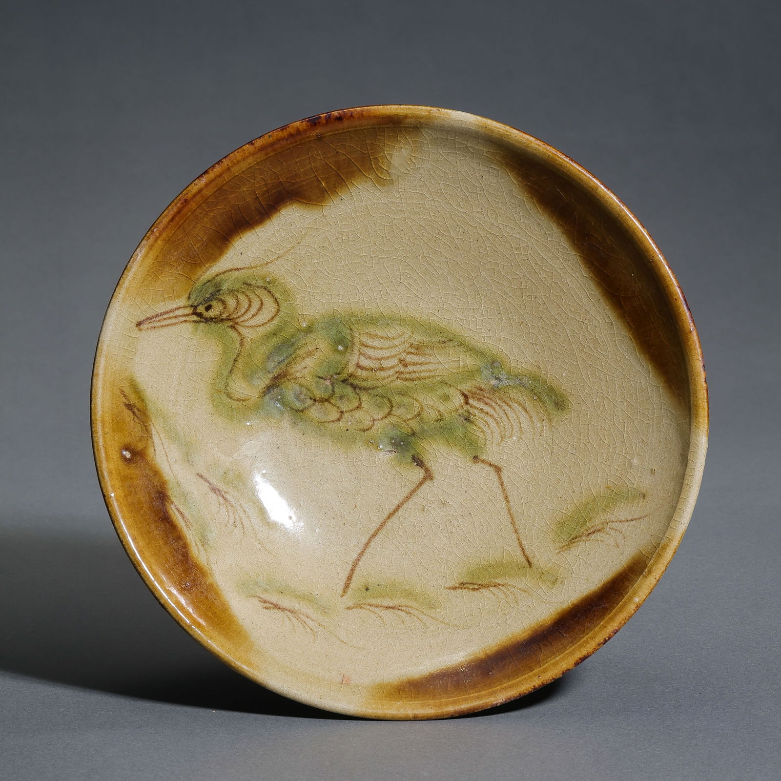 A painted bowl from the Changsha kiln in the Tang Dynasty, China.: Diam. 15.4 cm.