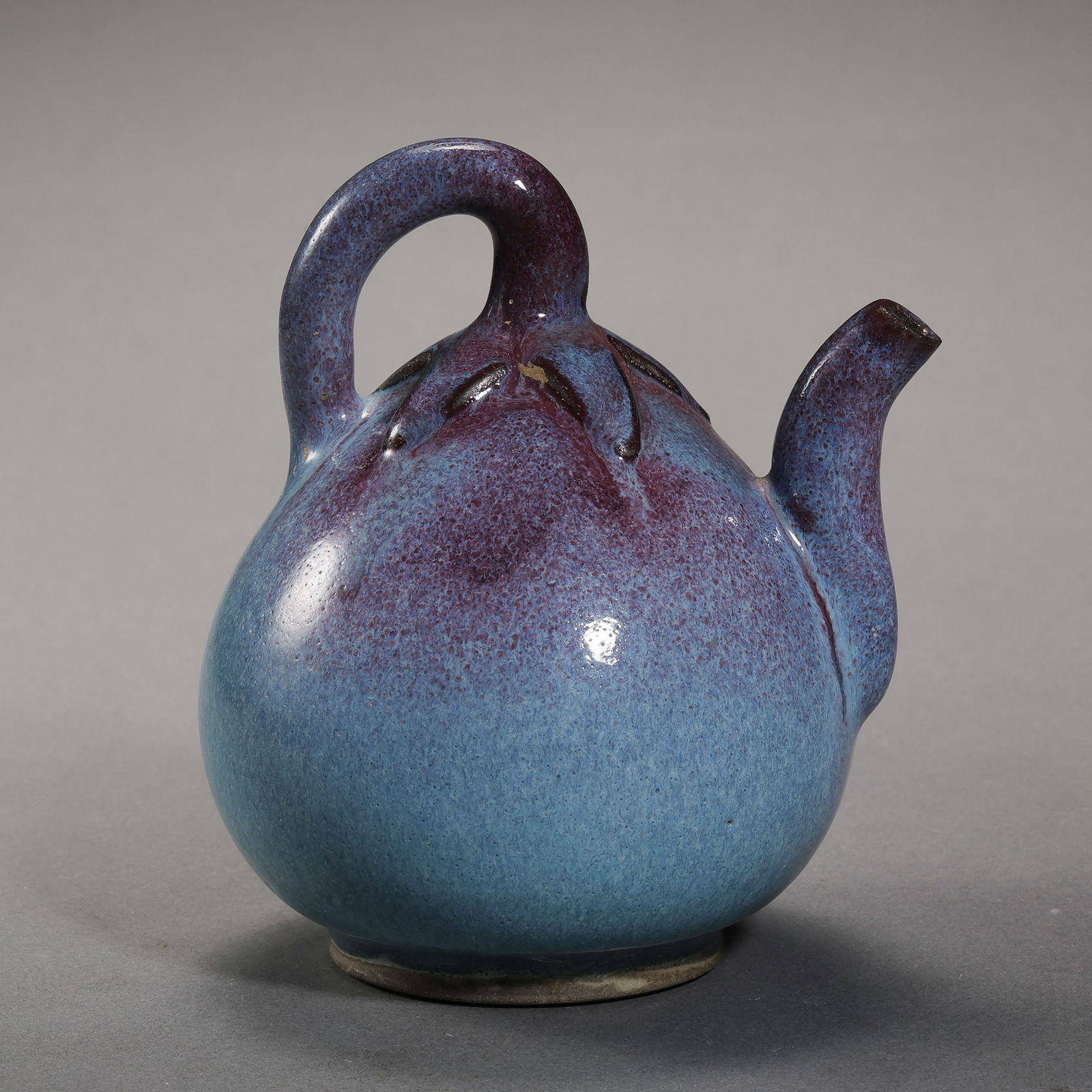 A Northern Song Dynasty Jun ware sky-blue glazed red-glazed reverse-flowing pot: H. 11 cm. W. 9.5 cm.