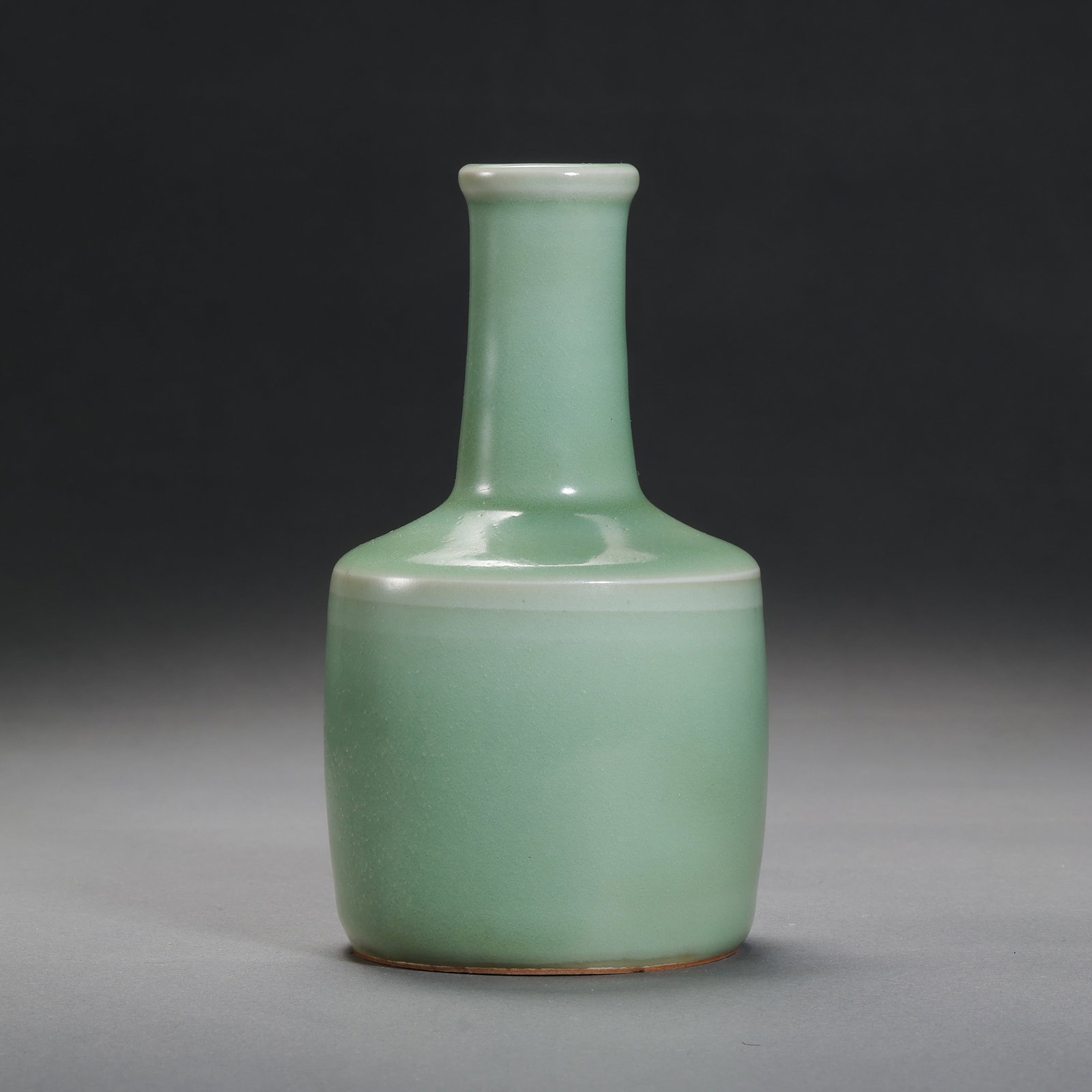 Longquan celadon mallet-shaped bottle from the Southern Song Dynasty in China: H. 13.3 cm. W. 7 cm.
