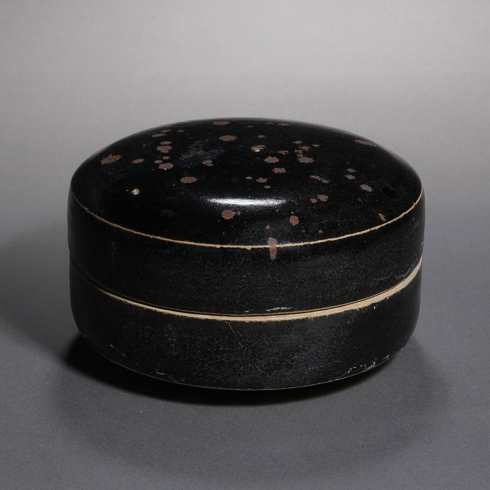 Northern Song Dynasty Cizhou Kiln Black Glazed Box with Iron Rust Spots: H. 7 cm. W. 11.5 cm.