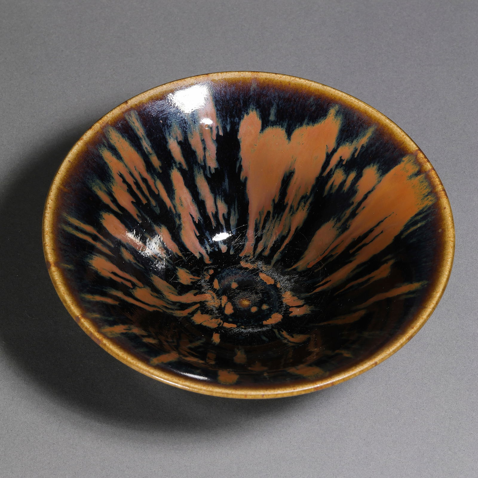 Iron-embroidered conical cup from Cizhou ware, Northern Song Dynasty, China: H. 6 cm. Diam. 14.3 cm.