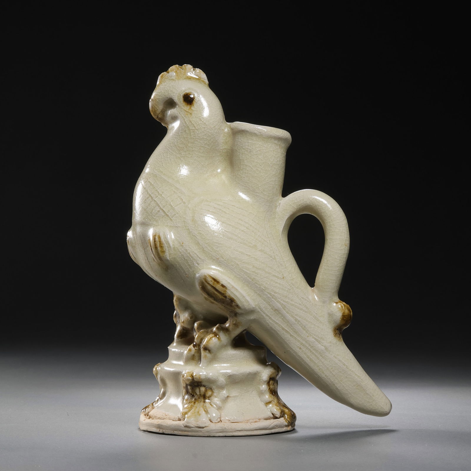 Chinese Sui Dynasty Xiangzhou Kiln Celadon Parrot Vase: H. 17 cm. W. 12.5 cm.