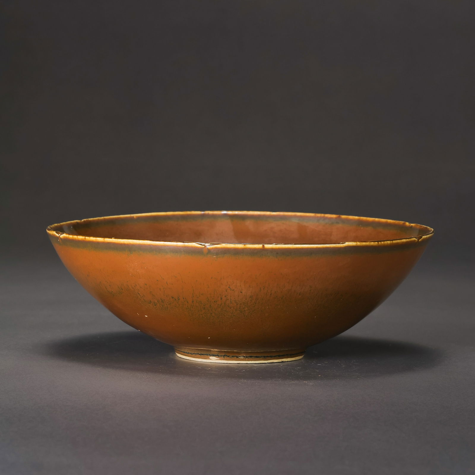 Chinese Song Dynasty Red Glazed Flower-Shaped Bowl: H. 5.9 cm. Diam. 16.1 cm.
