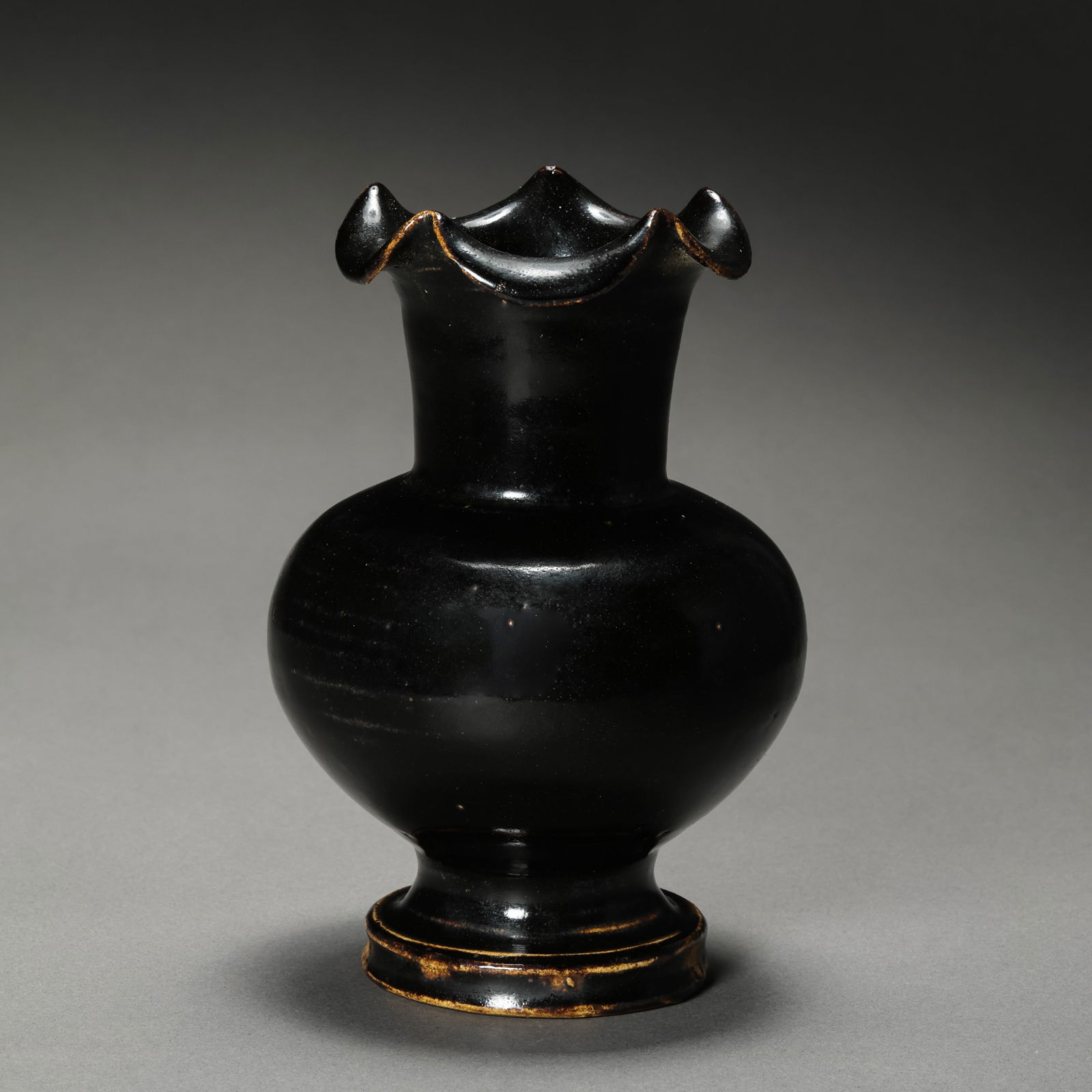 Northern Song Dynasty Cizhou Kiln Black Glazed Flower-Shaped Vase: H. 14.3 cm.