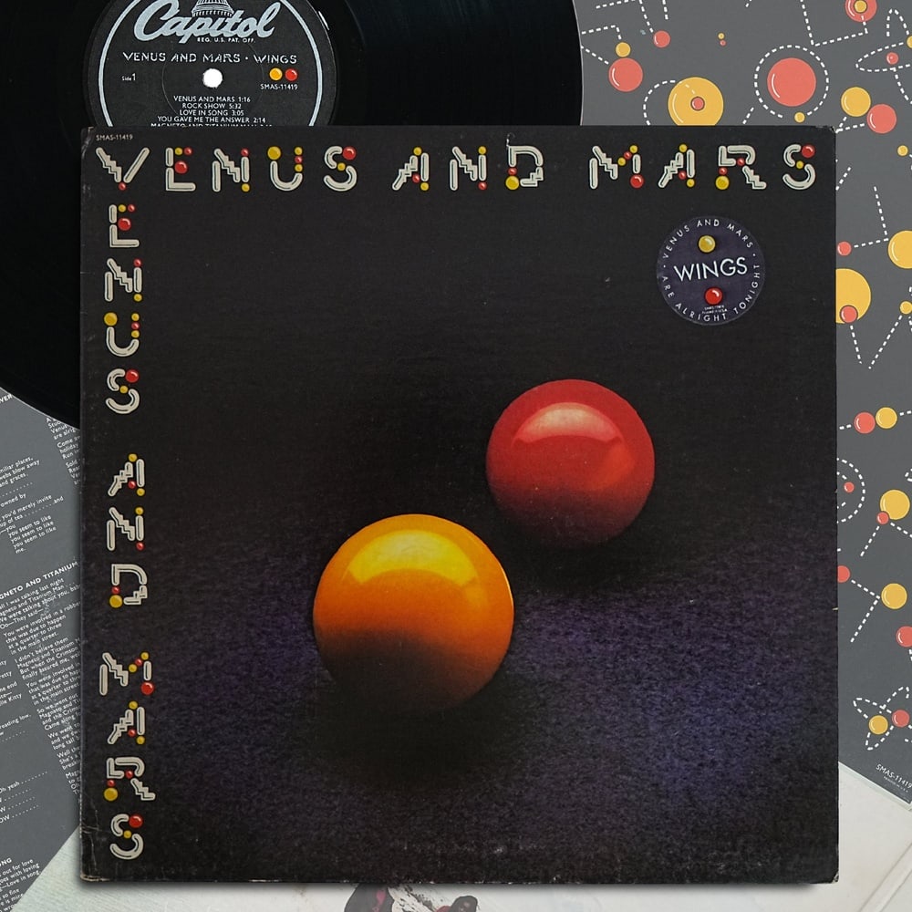 PAUL MCCARTNEY SIGNED "VENUS AND MARS" UK LP: 12 1/4 x 12 1/4 Provenance and Authentication: This collectible has undergone a rigorous forensic evaluation. The signatures were carefully analyzed across multiple criteria, including ink