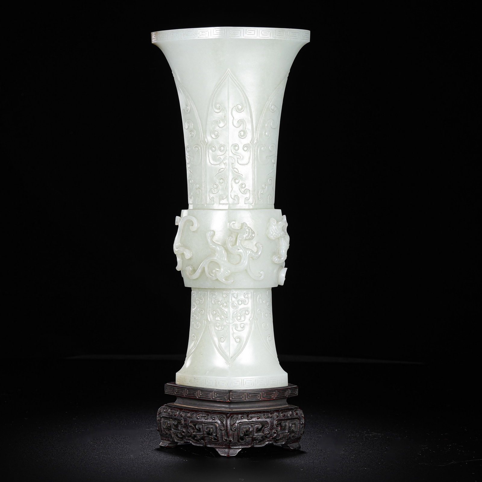 Chinese Qing Dynasty Hetian white jade vase with dragon design: H. 27.2 cm. W. 10.2 cm.
