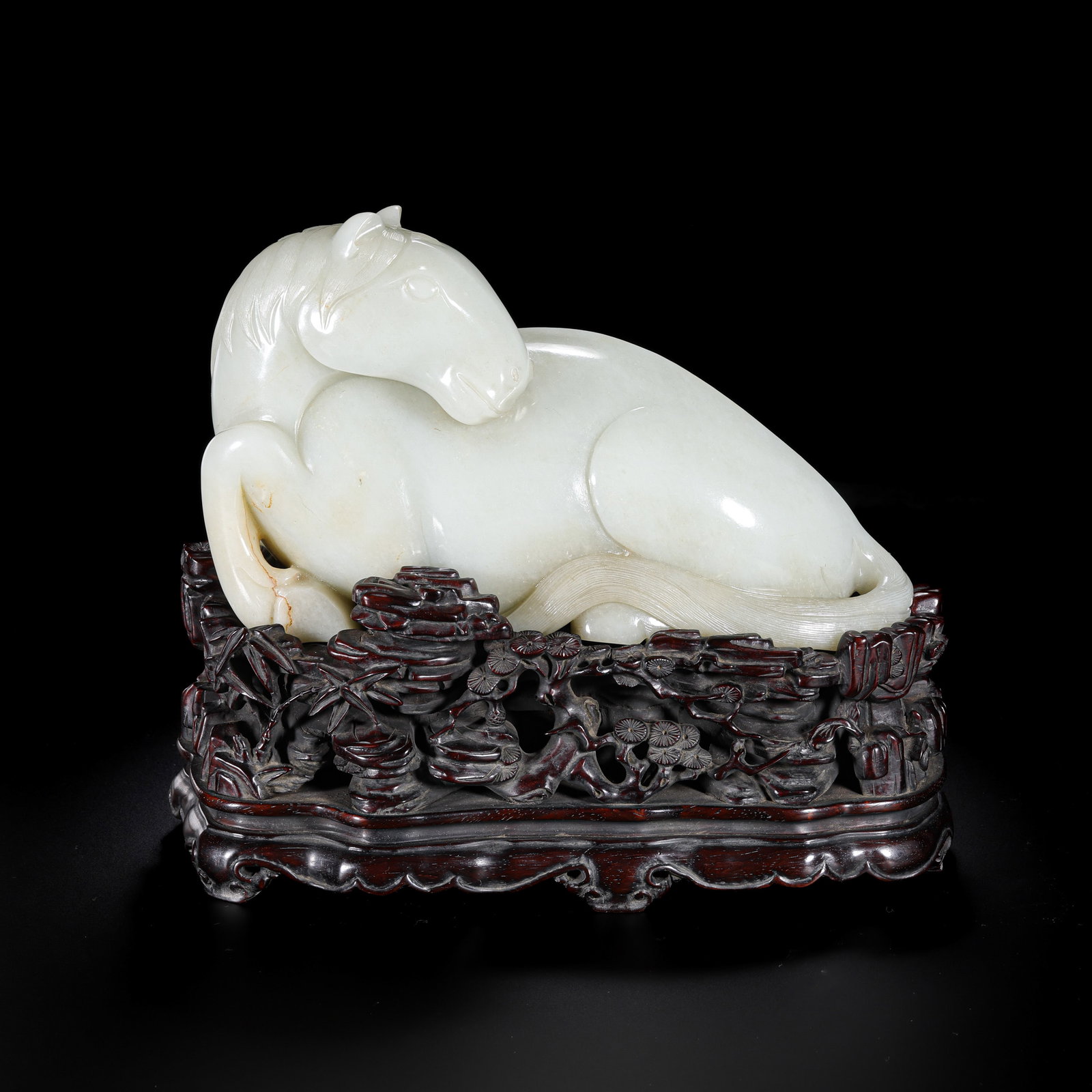 Chinese Qing Dynasty Hetian white jade reclining horse: H. 20 cm. W. 21 cm. Weight. 3450 gram.