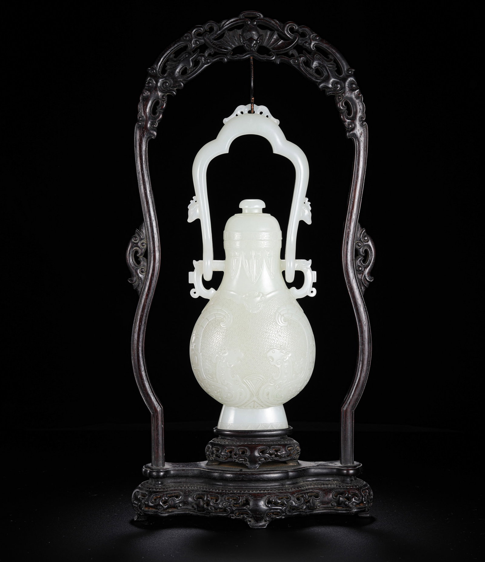 Chinese Qing Dynasty Hetian white jade covered bottle: H. 24.5 cm. W. 9.5 cm. Weight. 992.5 gram.