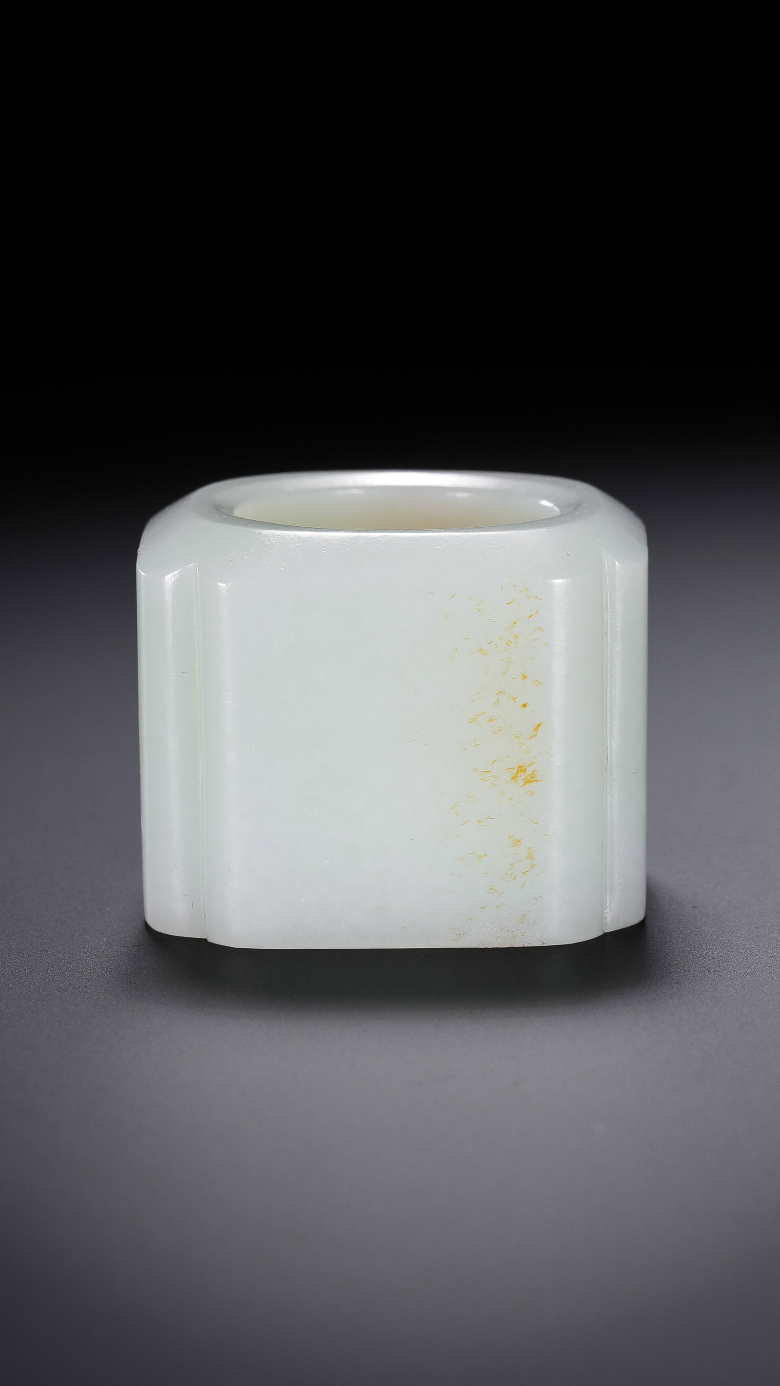 Chinese Qing Dynasty Hetian white jade thumb ring: H. 2.7 cm. W. 3.3 cm. Weight. 53 gram.