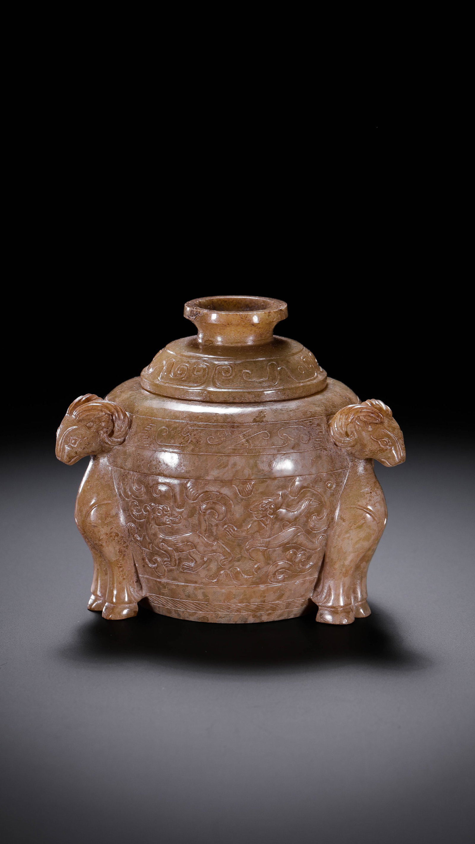 Chinese Han Dynasty Jade Jar with Three Ram Heads: H. 7.6 cm. W 8.5 cm. Weight. 245 gram.