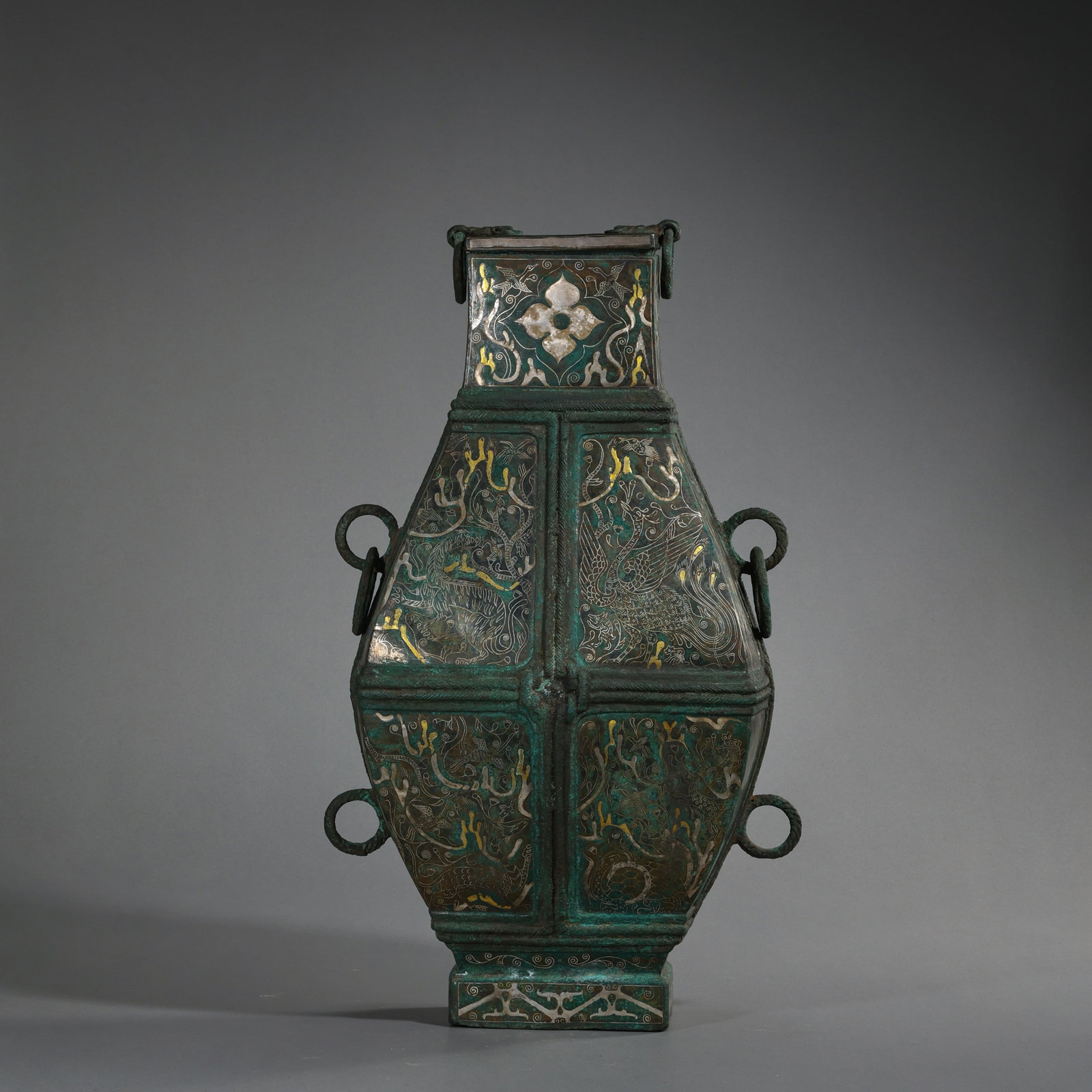 A square vase with gold and silver inlay and ring handles from the Warring States period of China: H. 41 cm. W. 20 cm. Weight. 3850 gram.